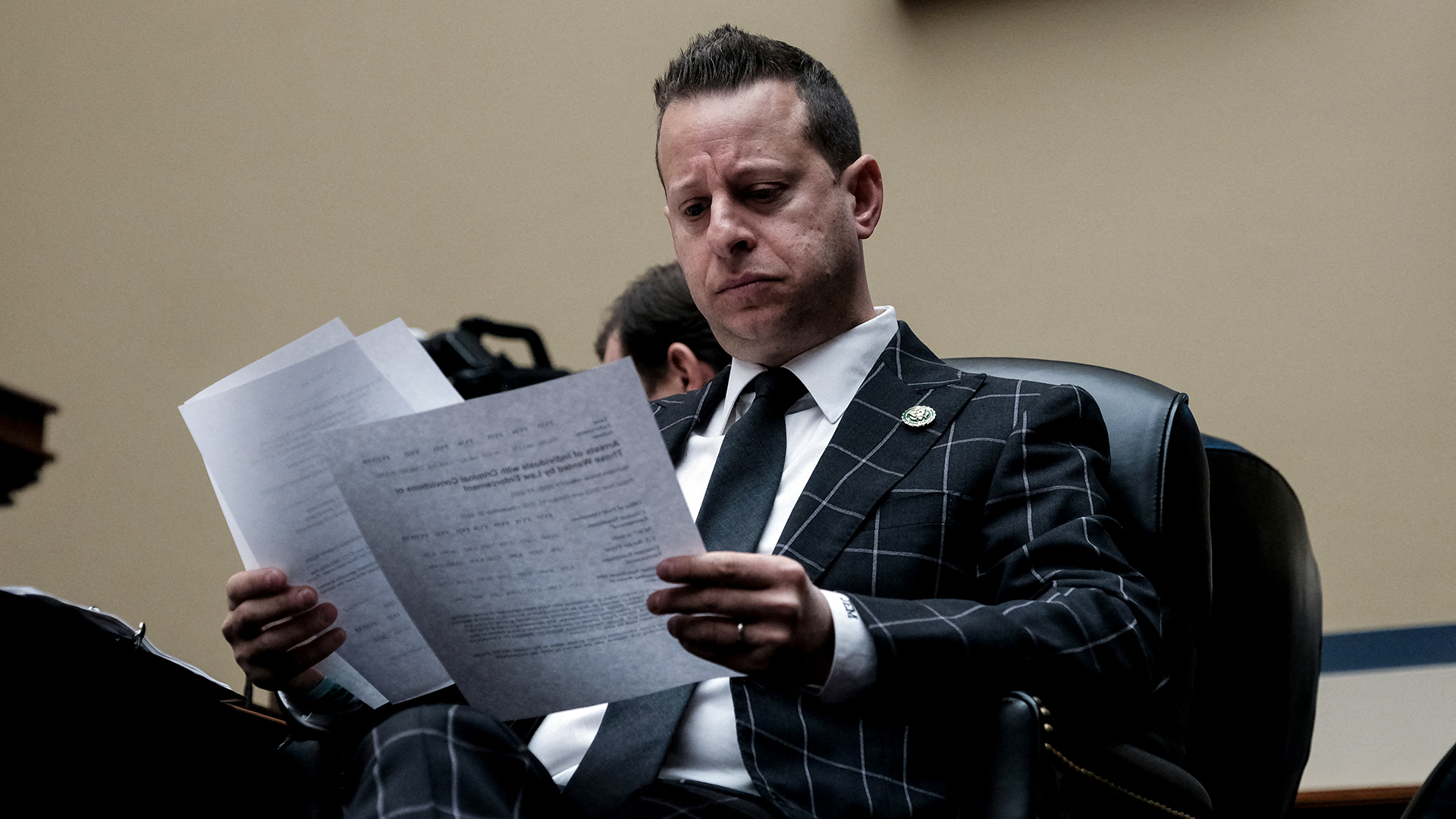 Rep. Jared Moskowitz reviews notes during a House Oversight Committee hearing on the “border crisis” on Capitol Hill in Washington, DC, in February.