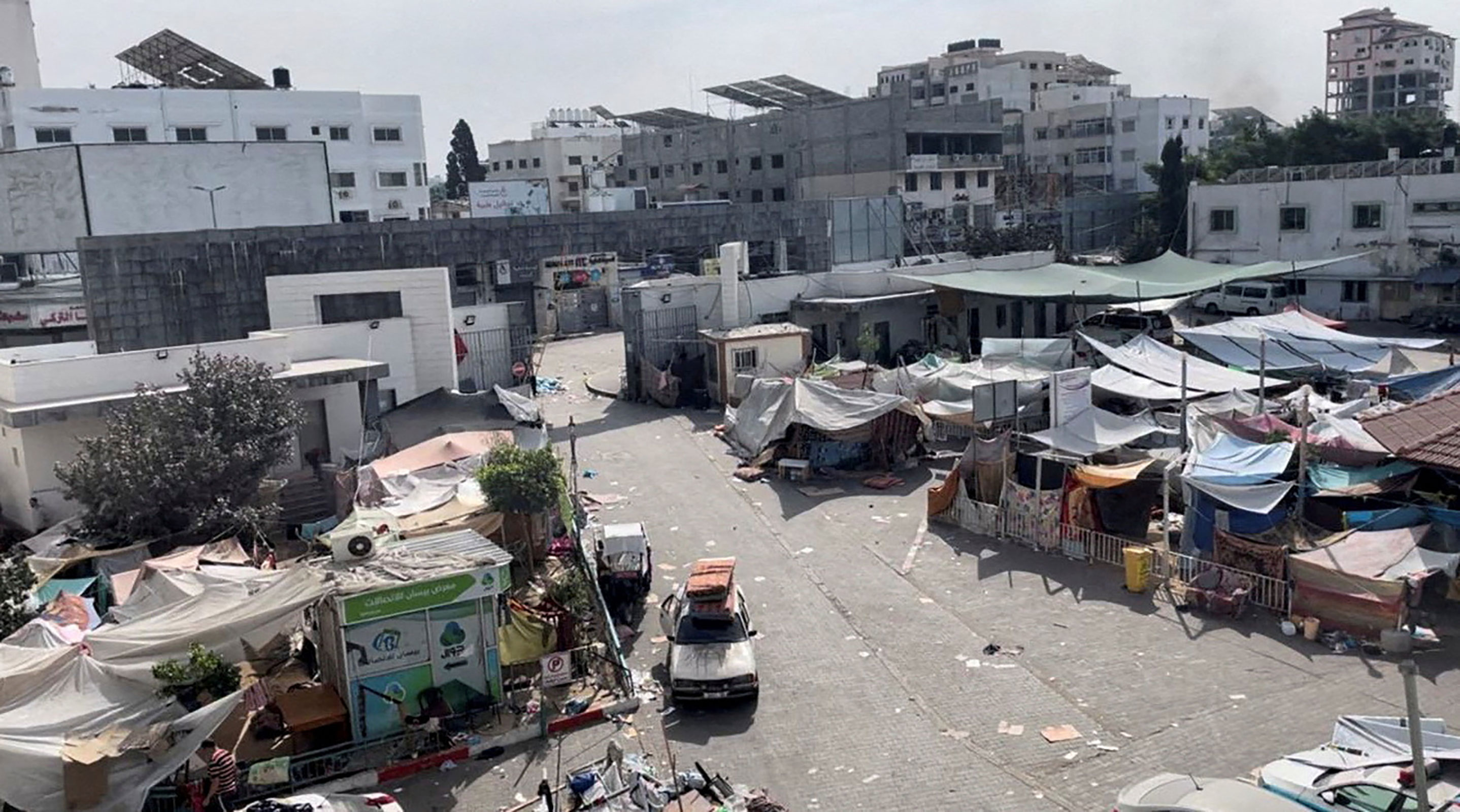Tents and shelters used by displaced Palestinians stand at the yard of Al-Shifa hospital in Gaza City on November 12.