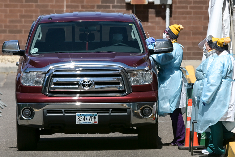 North Memorial Hospital medical workers provided drive-up COVID-19 testing outside the North Memorial Health Hospice in Robbinsdale, Minnesota on May 8.