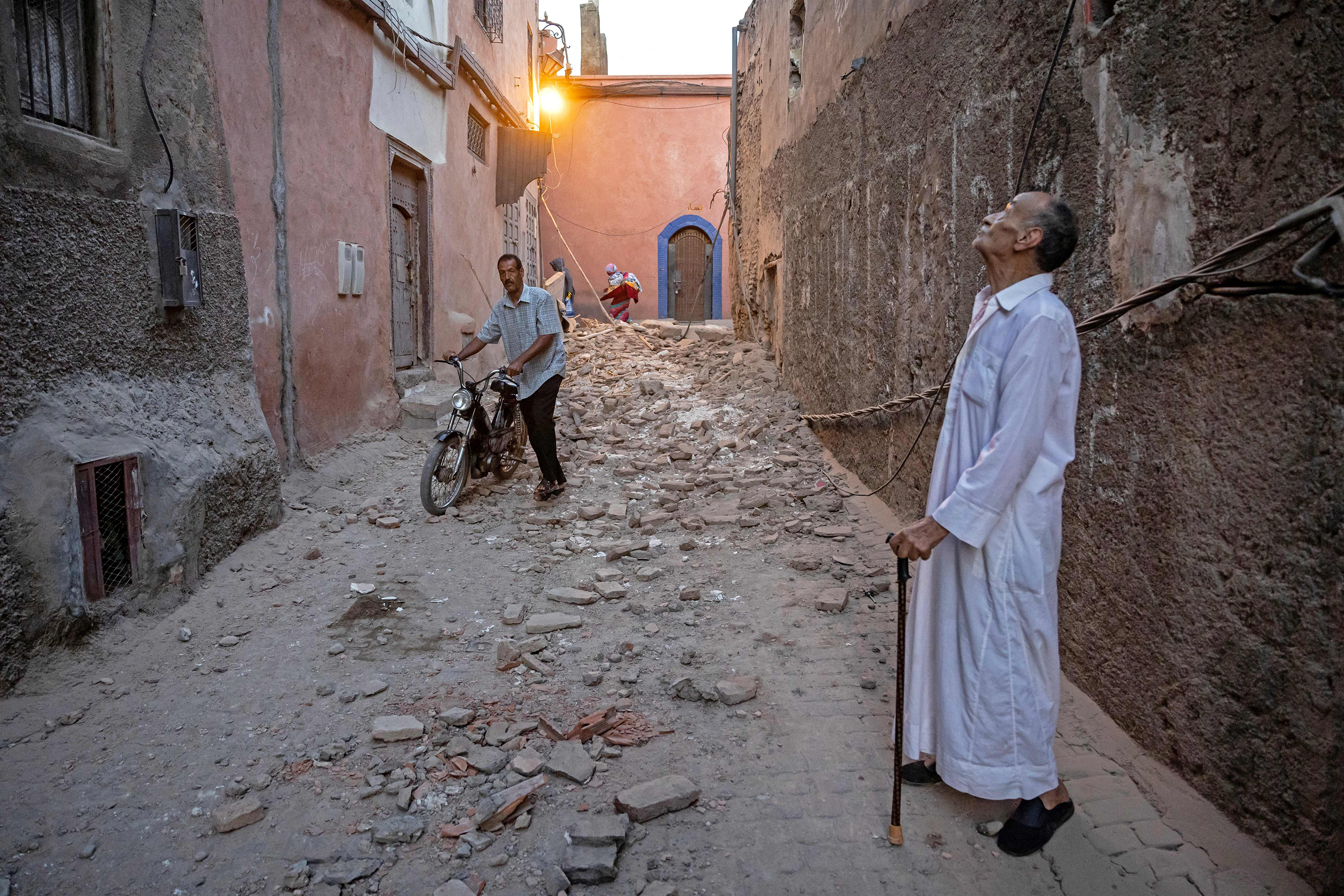 A resident looks at a damaged building in Marrakech on September 9.