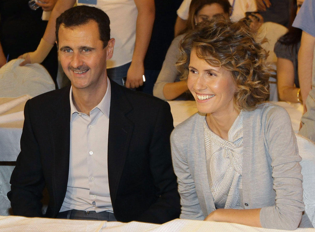 Syrian President Bashar Assad and his wife, Asma, are seen in a hotel in Damascus on September 5, 2010.