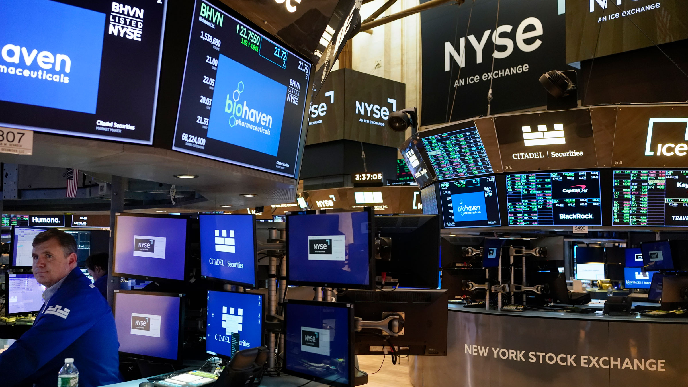 Traders work on the floor of the New York Stock Exchange on Friday.