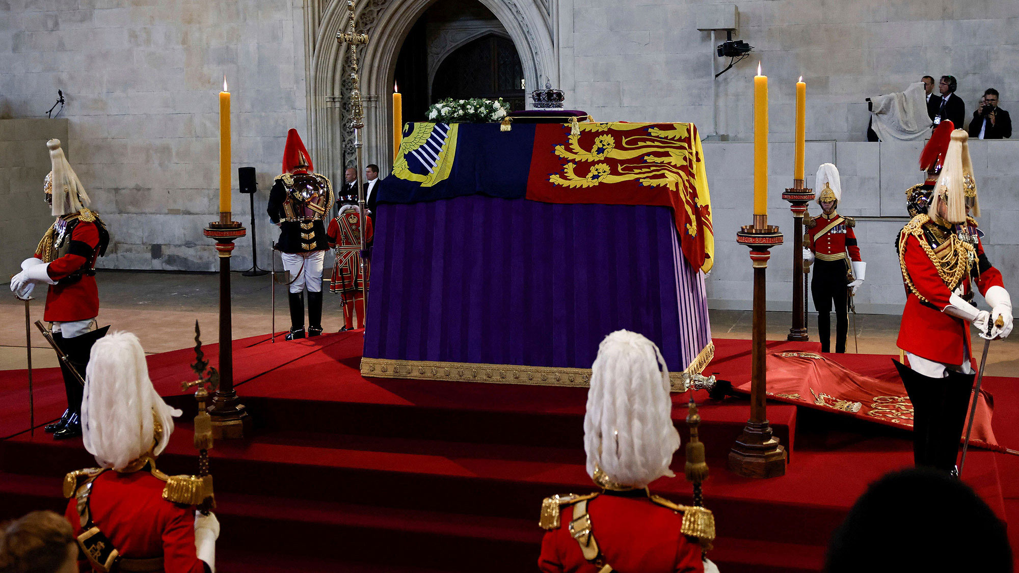 The coffin of Queen Elizabeth II, adorned with the Imperial State Crown, rests on a raised platform inside London's Westminster Hall on Wednesday, September 14.