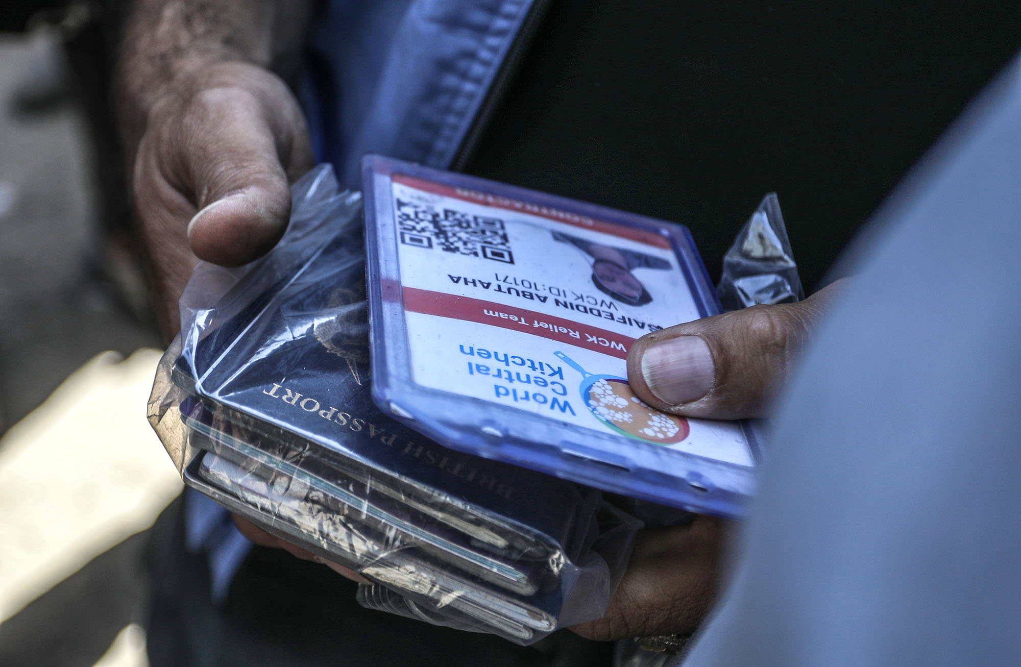 A view of the ID cards belonging to volunteers of the US-based international volunteer aid organization World Central Kitchen (WCK) who were killed in an Israeli attack in Rafah, Gaza, on April 3.