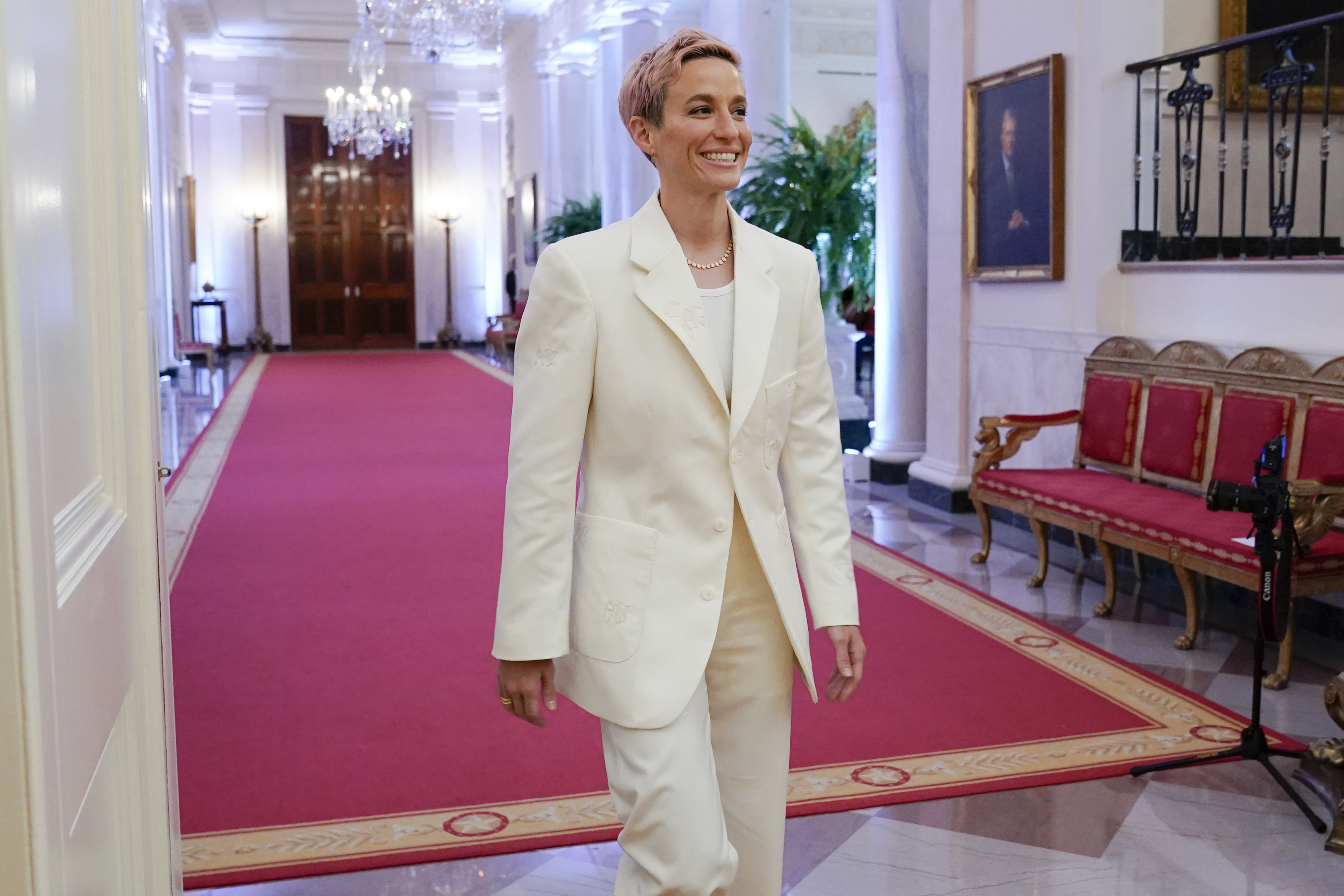 Soccer star and Olympic gold medalist Megan Rapinoe arrives to attend a ceremony to award the nation's highest civilian honor, the Presidential Medal of Freedom, in the East Room of the White House in Washington, on July 7, 2022. 