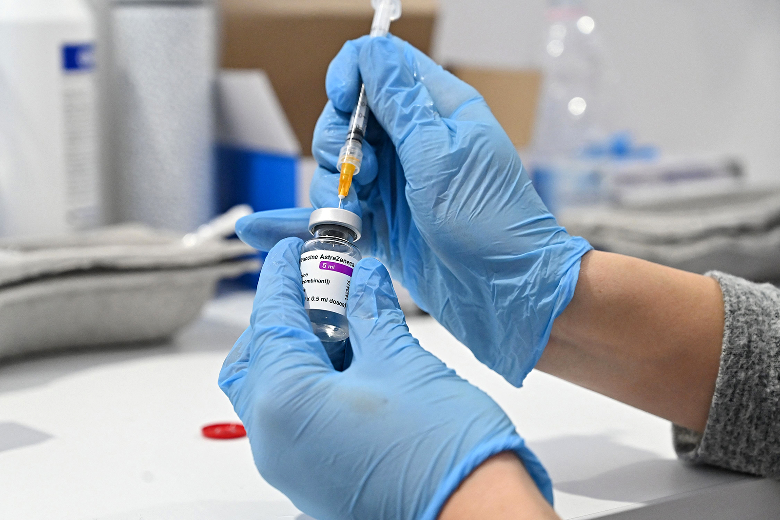 A medical worker fills a syringe from a vial of the AstraZeneca Covid-19 vaccine in Rome, on March 24.
