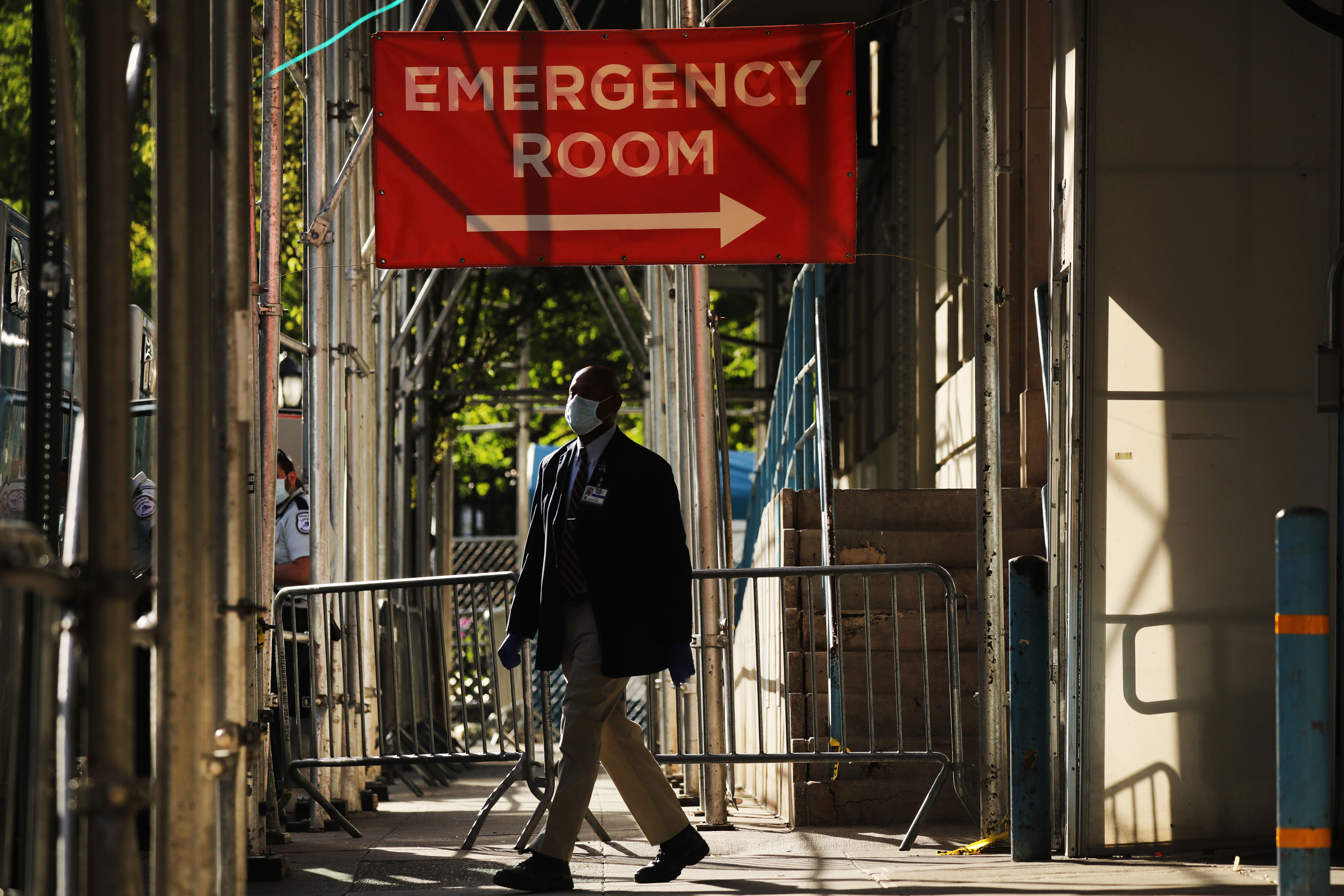 A sign at a Manhattan hospital treating coronavirus patients directs visitors to the emergency room entrance on May 12 in New York.