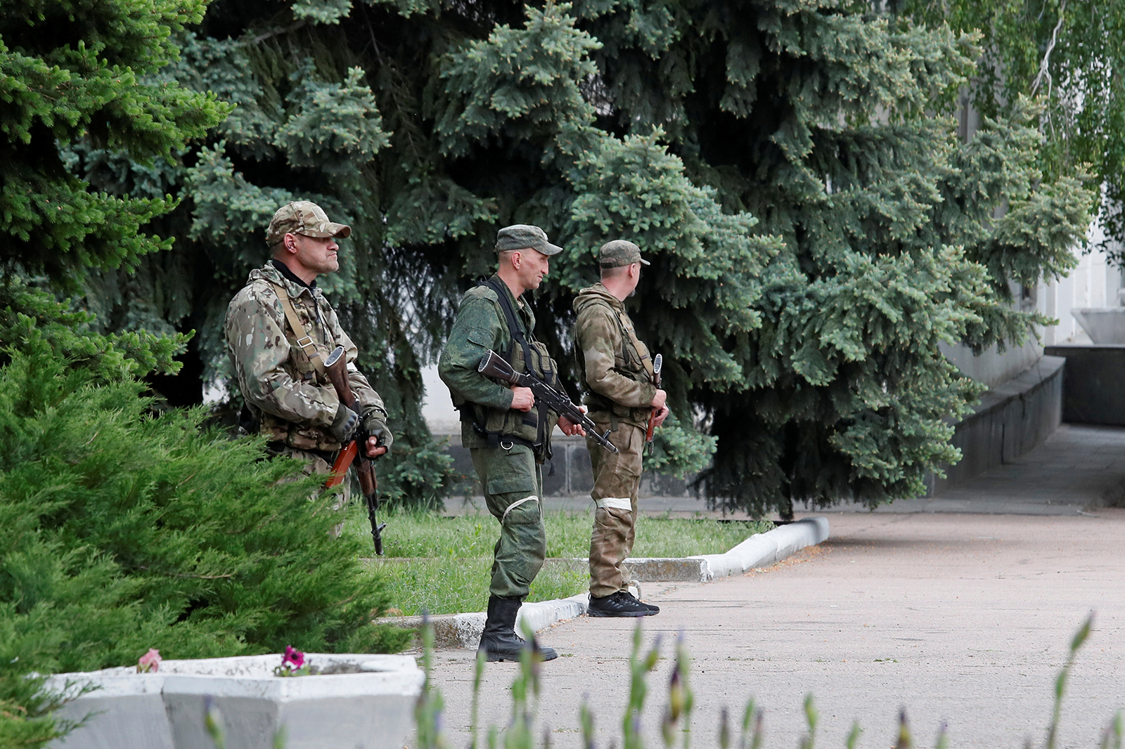 Service members of pro-Russian troops stand guard in Svitlodarsk, Donetsk region, Ukraine on May 25, 2022. 