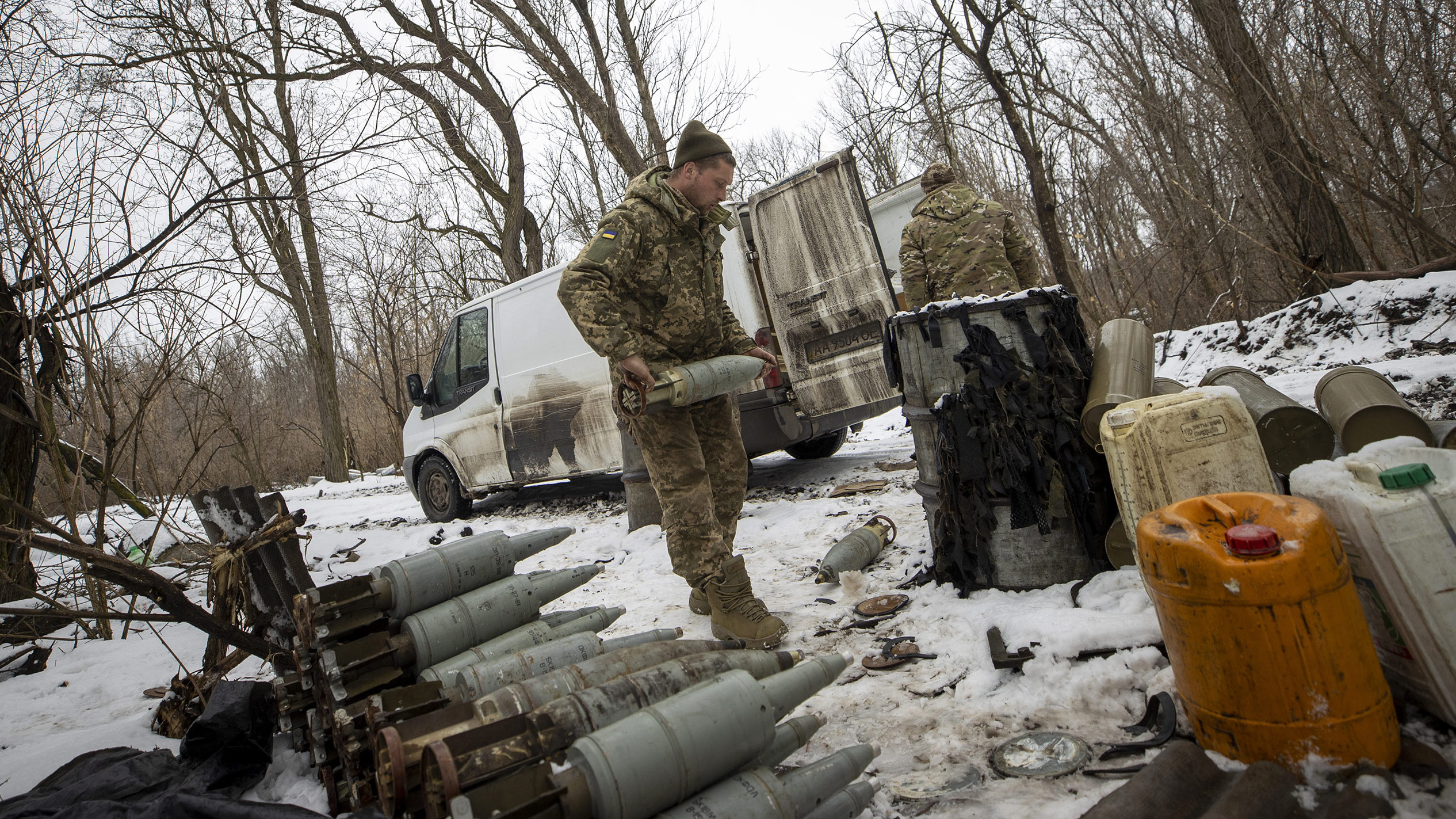 Ukrainian soldiers load ammunition on the frontline near Vuhledar, Ukraine on February 14. 