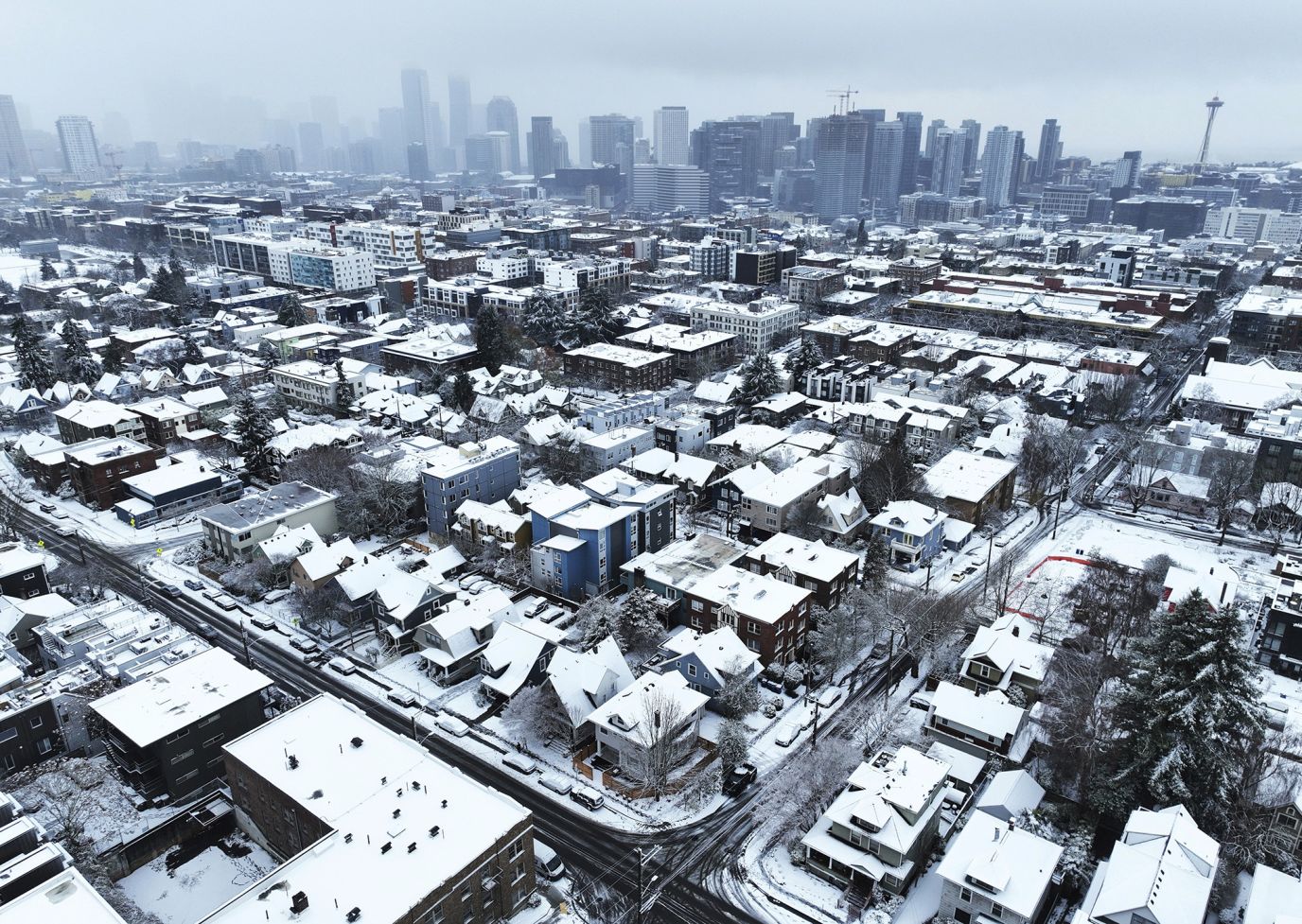 Snow covers homes in Seattle on Tuesday, December 20. 