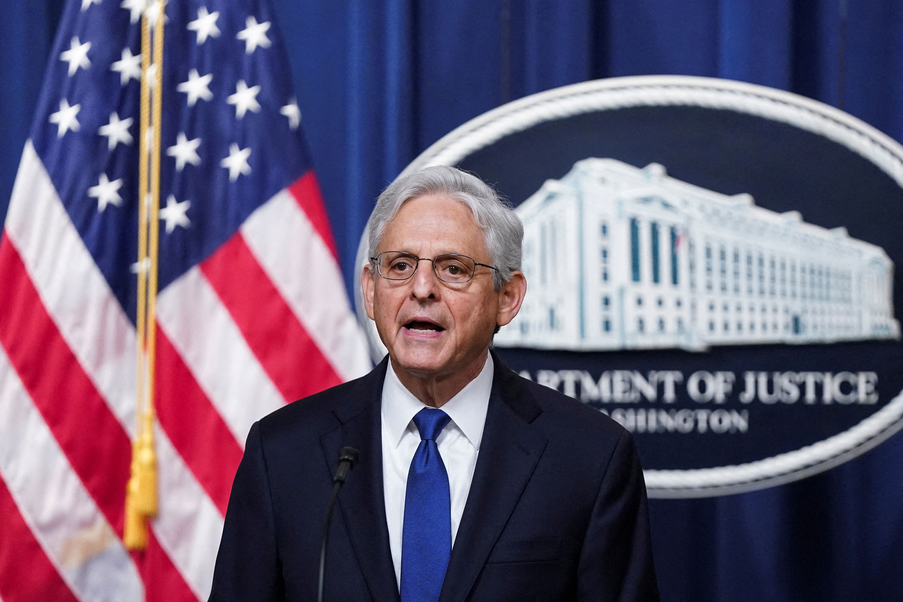 Attorney General Merrick Garland gives a brief statement at the Justice Department in August.