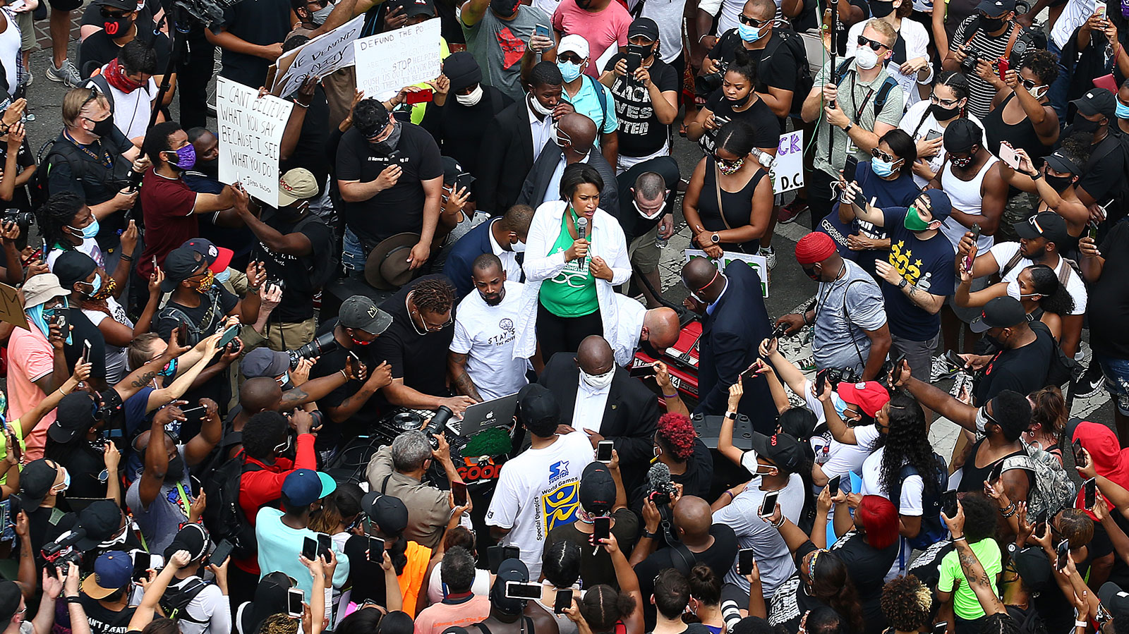 District of Columbia Mayor Muriel Bowser (C) speaks to demonstrators gathered on the newly named Black Lives Plaza during a peaceful protest against police brutality and racism in Washington, DC on June 6.