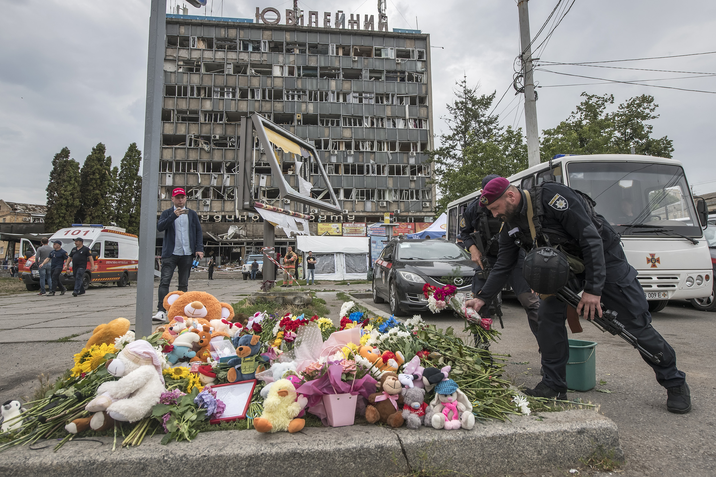 Ukrainian servicemen lay flowers and toys at a place where a child was killed during a Russian cruise missile strike in Vinnytsia, Ukraine, on July 15.
