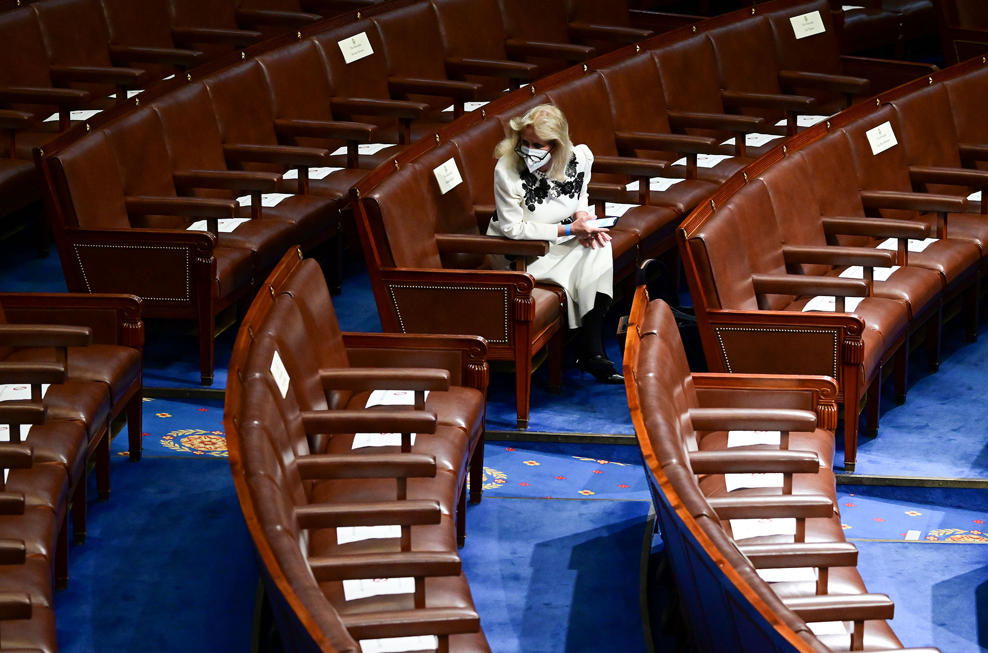 Rep. Debbie Dingell waits in her seat ahead of President Joe Biden speaking to a joint session of Congress, on Wednesday, April 28, in Washington.