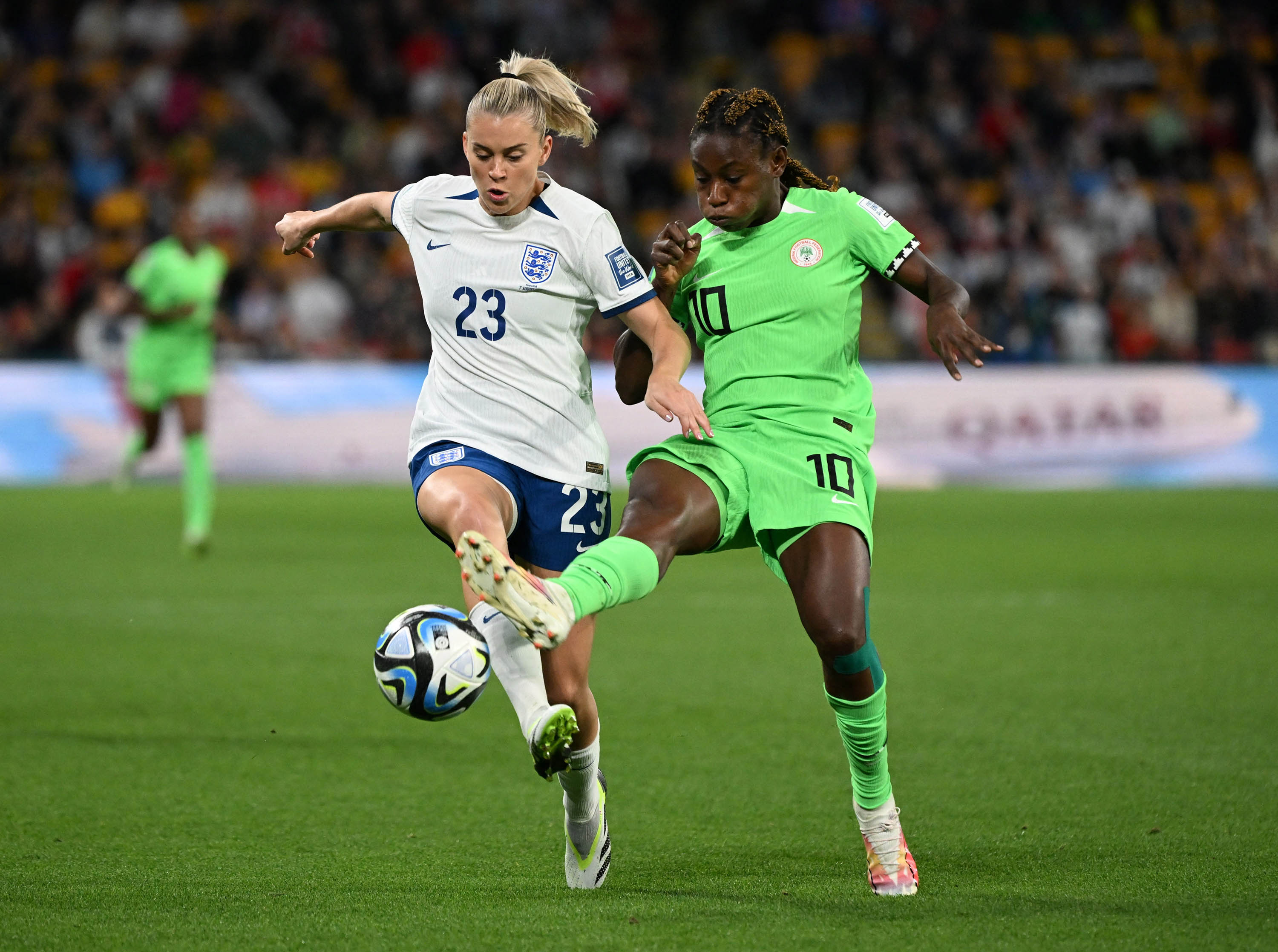 England's Alessia Russo is seen in action with Nigeria's Christy Ucheibe in Brisbane, Australia, in August 7. 