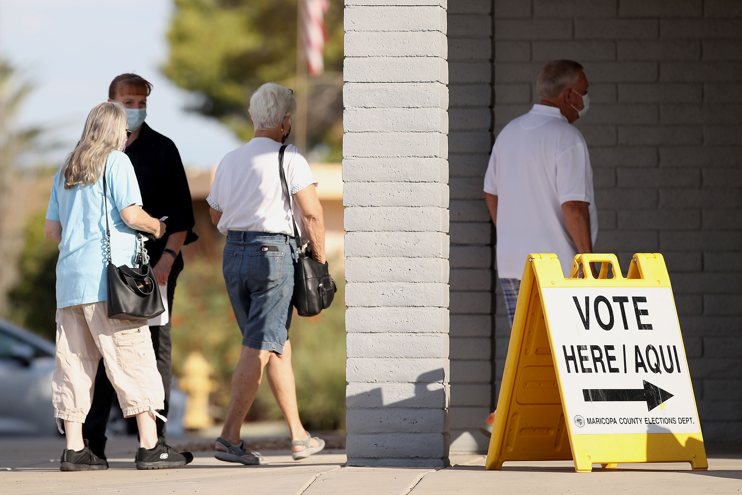 Voters arrive to a polling location in Sun City, Arizona, on November 3.