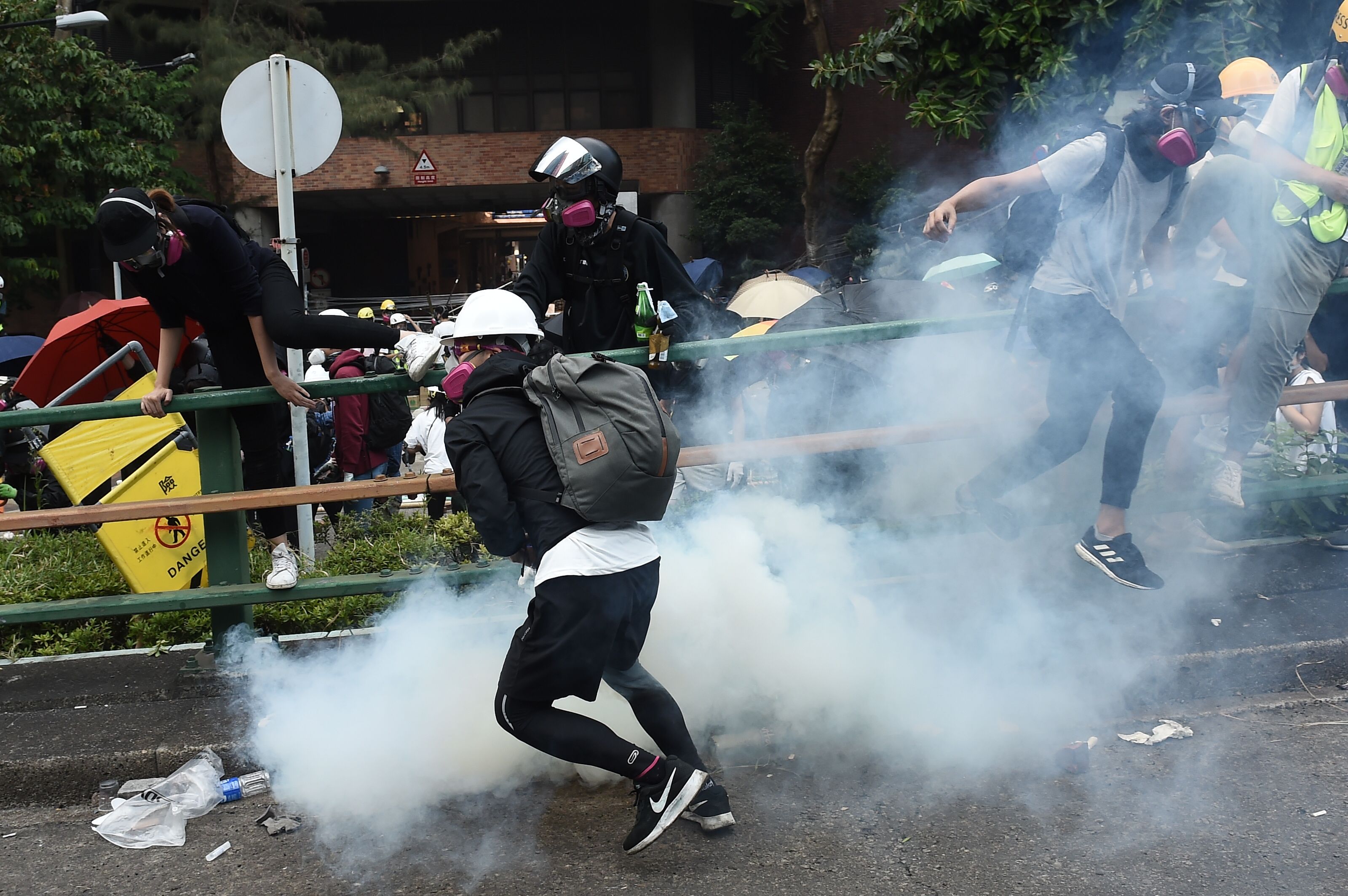 Police fire tear gas as protesters try to leave Hong Kong Polytechnic University on November 18, 2019.