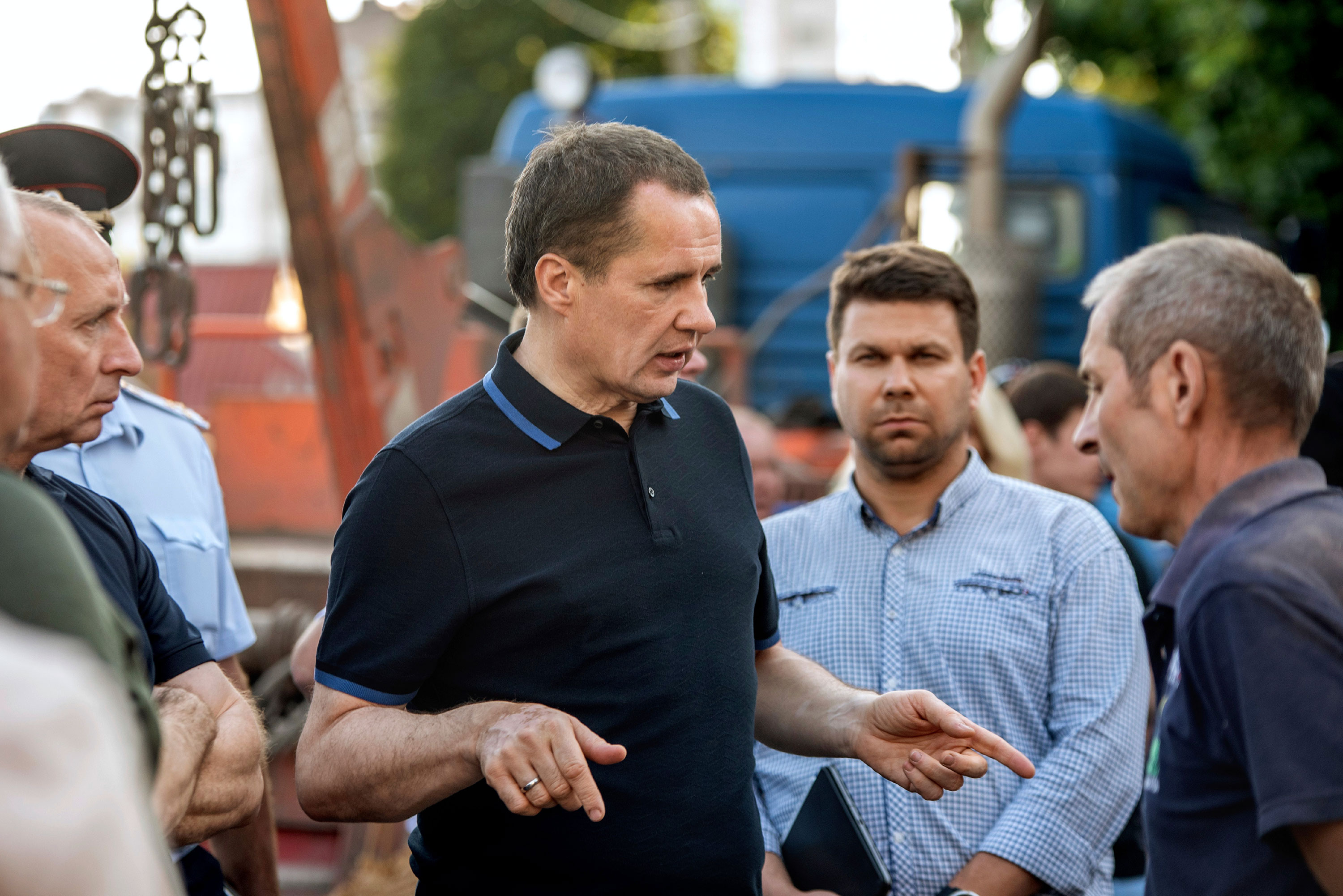 Vyacheslav Gladkov, center, speaks during a meeting with local residents in Belgorod, Russia, in July.