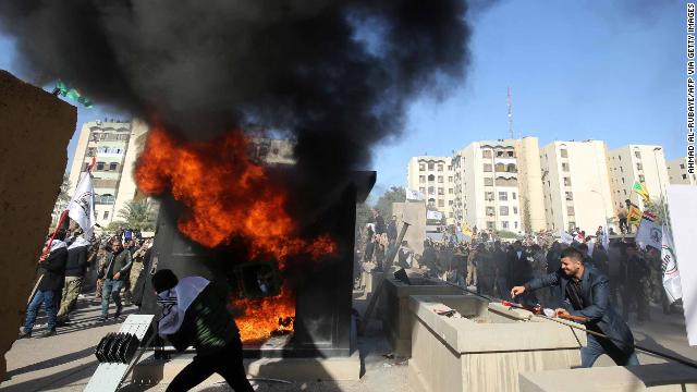 A blaze outside the US embassy in the Iraqi capital, Baghdad, on Tuesday.