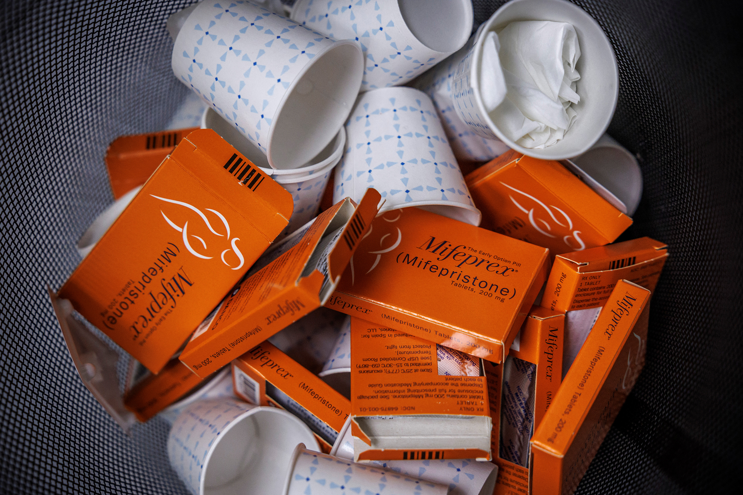Empty boxes of mifepristone pills fill a trash can at Alamo Women's Clinic in Albuquerque, New Mexico, in January 2023.