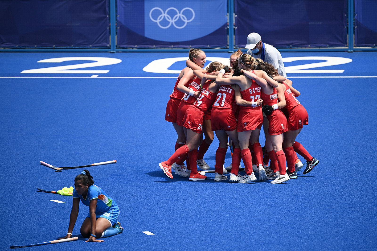 Great Britain's field hockey team celebrates after winning the women's bronze medal match by defeating India 4-3 on Friday.