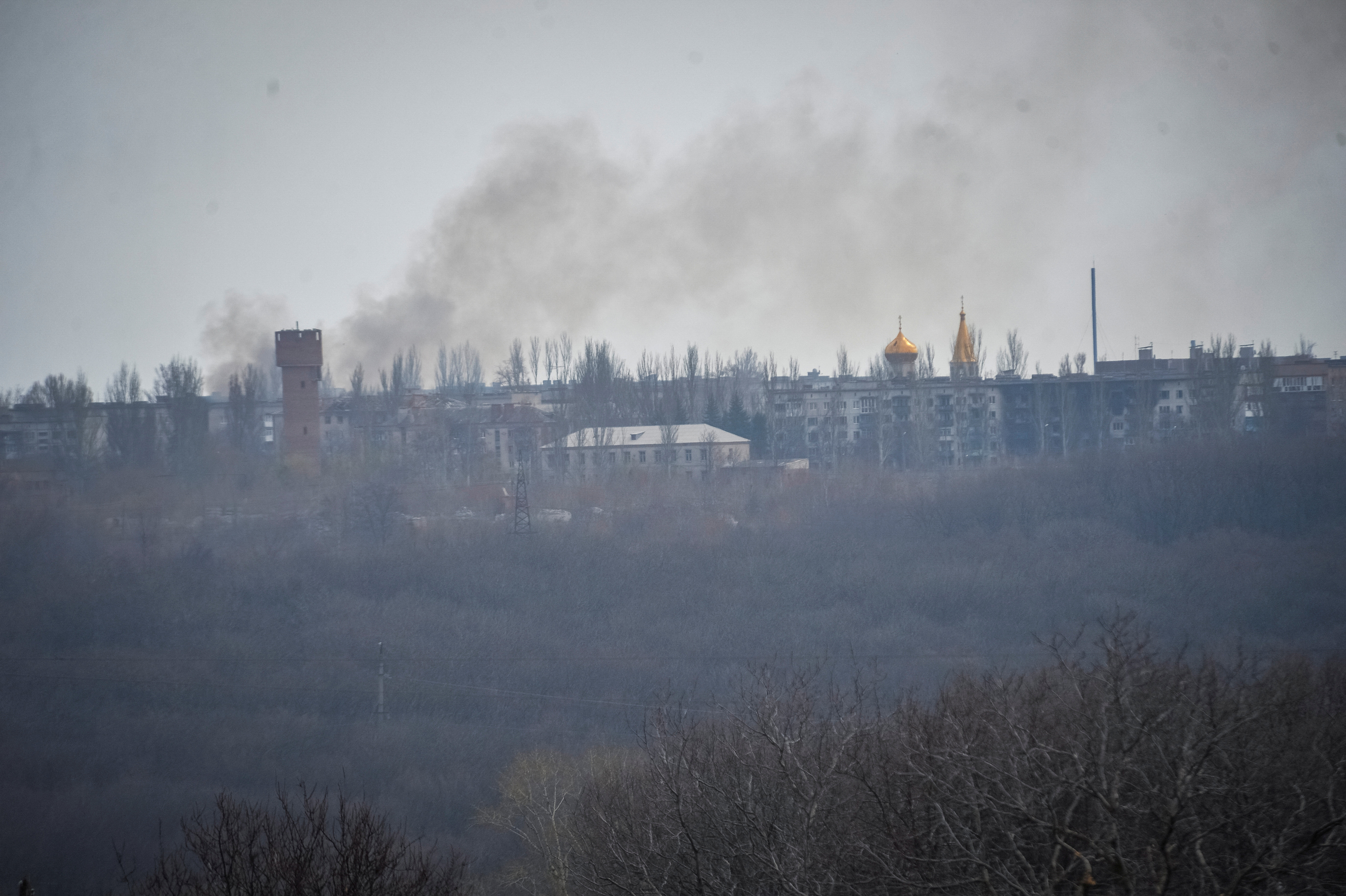 Smoke billows during shelling on the outskirts of Chasiv Yar on April 7.