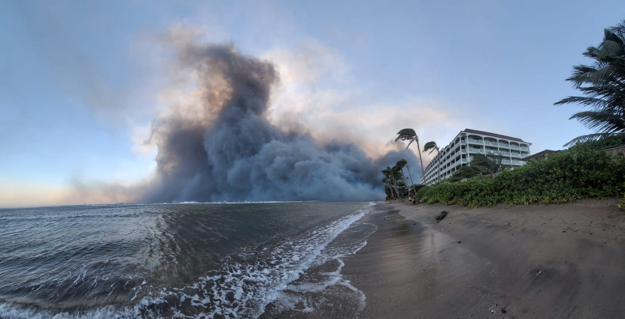 Smoke billows as wildfires driven by high winds destroy a large part of the historic town of Lahaina, in Kahului, on Wednesday.