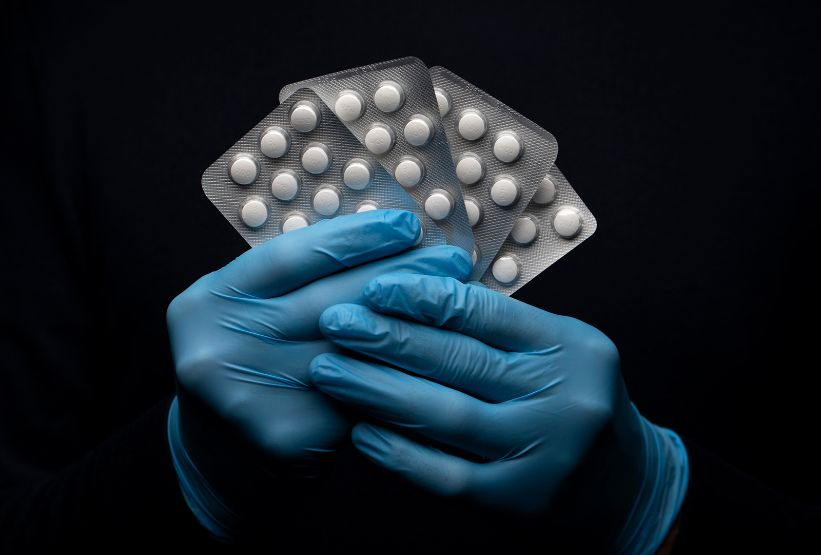 In this photo illustration a pack of Hydroxychloroquine Sulfate medication is held up on March 26 in London.