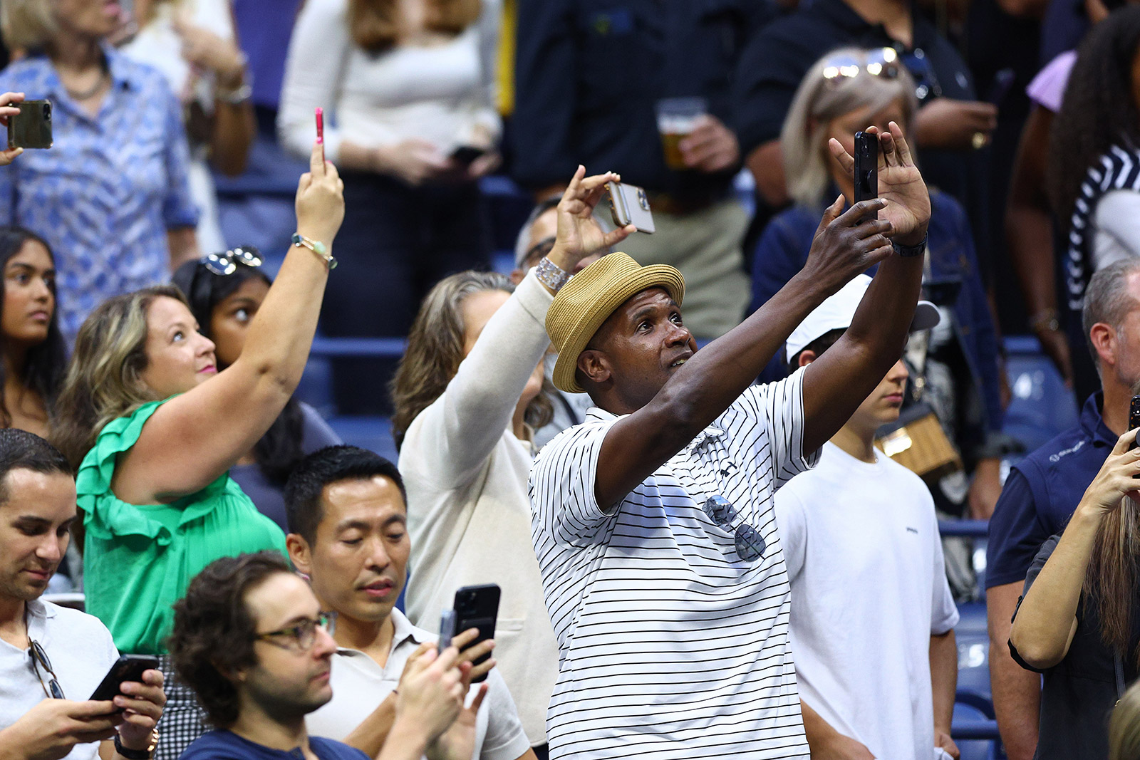 Fans watch as Serena Williams is introduced on Friday.