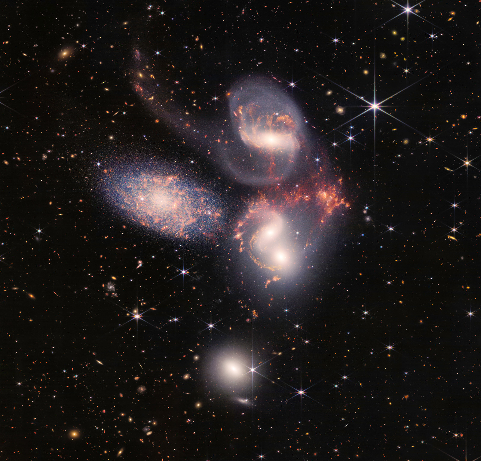 Today, NASA’s James Webb Space Telescope reveals Stephan’s Quintet, a visual grouping of five galaxies, in a new light. This enormous mosaic is Webb’s largest image to date, covering about one-fifth of the Moon’s diameter. It contains over 150 million pixels and is constructed from almost 1,000 separate image files. The information from Webb provides new insights into how galactic interactions may have driven galaxy evolution in the early universe.