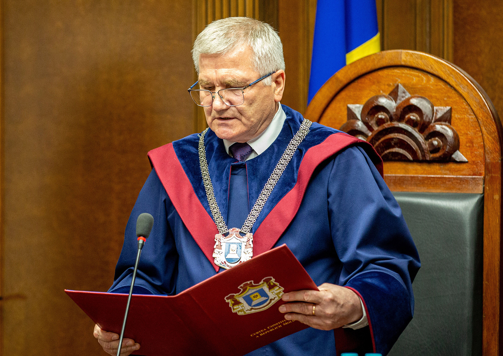 President of The Constitutional Court of Moldova, Judge Nicolae Rosca, reads the decision of the Court to outlaw the opposition "Shor" party of fugitive pro-Russian oligarch Ilan Shor, in Chisinau, on June 19.