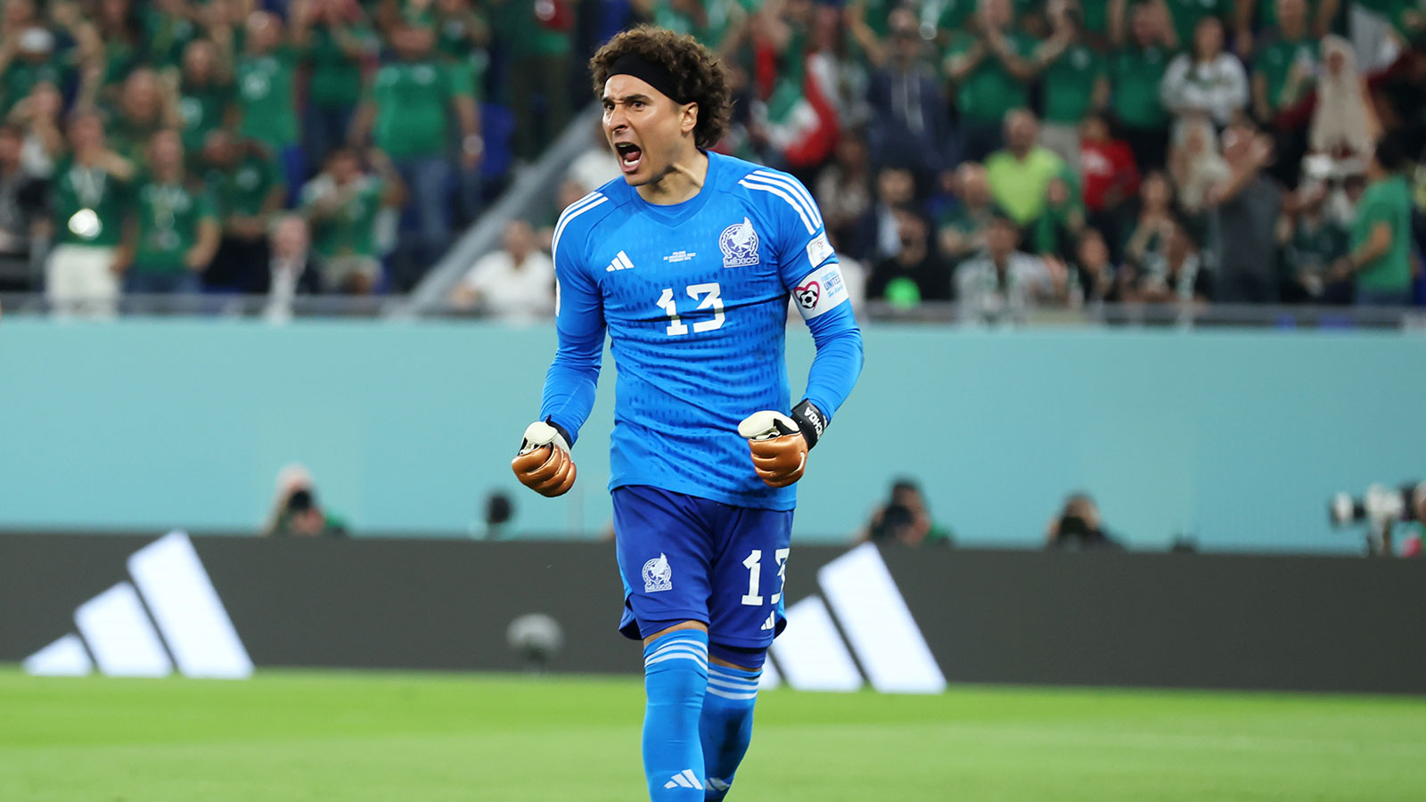 Mexico's Guillermo Ochoa  reacts after saving a penalty shot during the match against Poland on November 22.