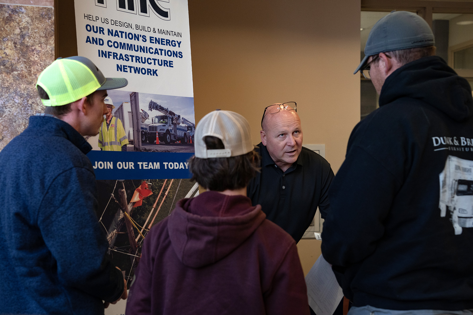 A representative speaks with jobseekers during a Construction Career Fair at Cape Fear Community College in Wilmington, North Carolina, US, on March 15.