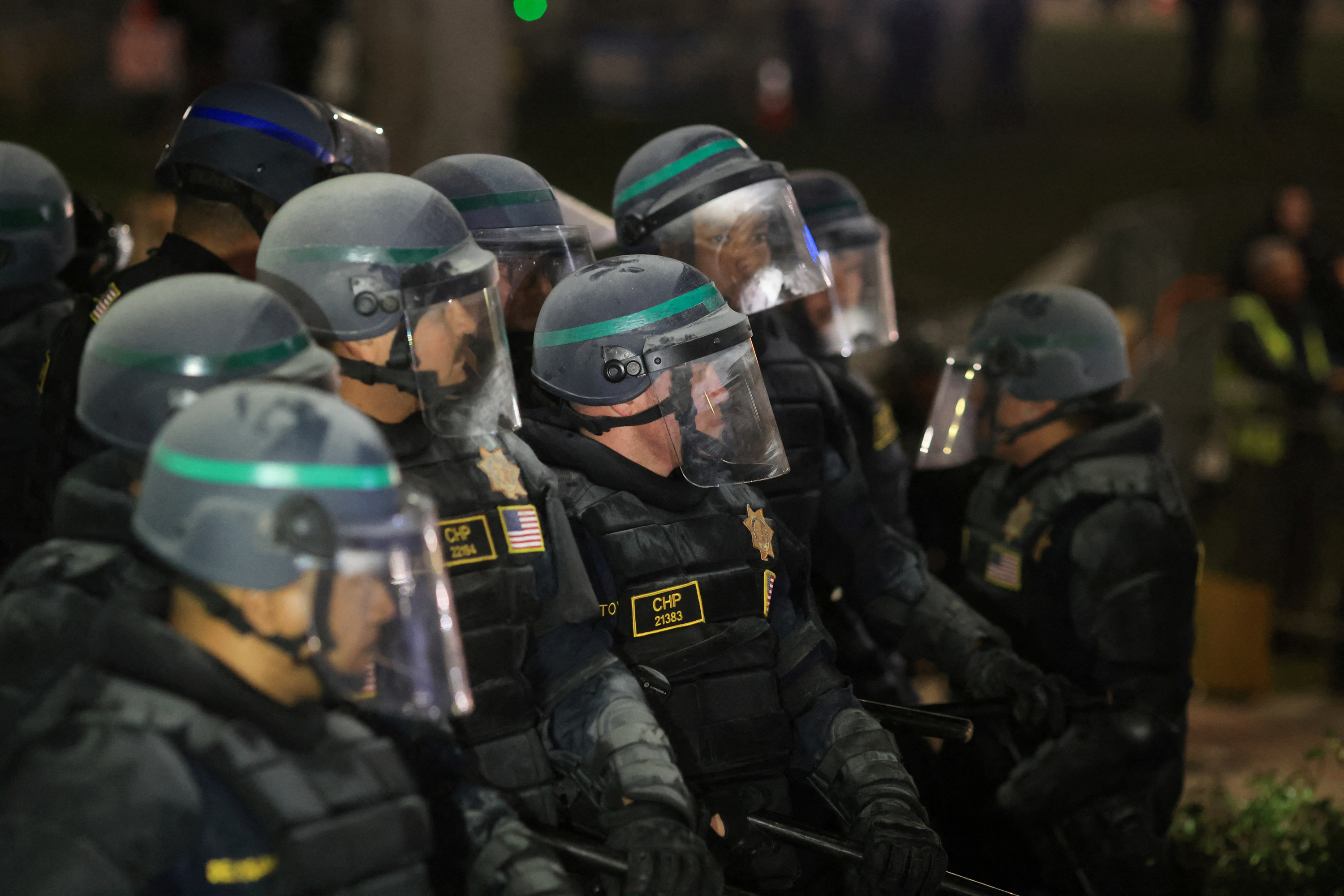 Law enforcement officers stand guard during a protest at UCLA in Los Angeles, California, on May 2.