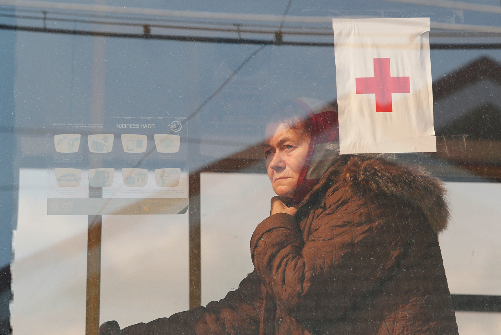 A woman is seen inside a bus before departing from a temporary accommodation center for evacuees during Ukraine-Russia conflict in the village of Bezimenne in the Donetsk Region, Ukraine on May 1.