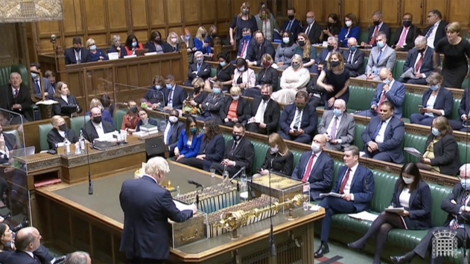 UK Prime Minister Boris Johnson, bottom left, addresses Parliament on August 18.
