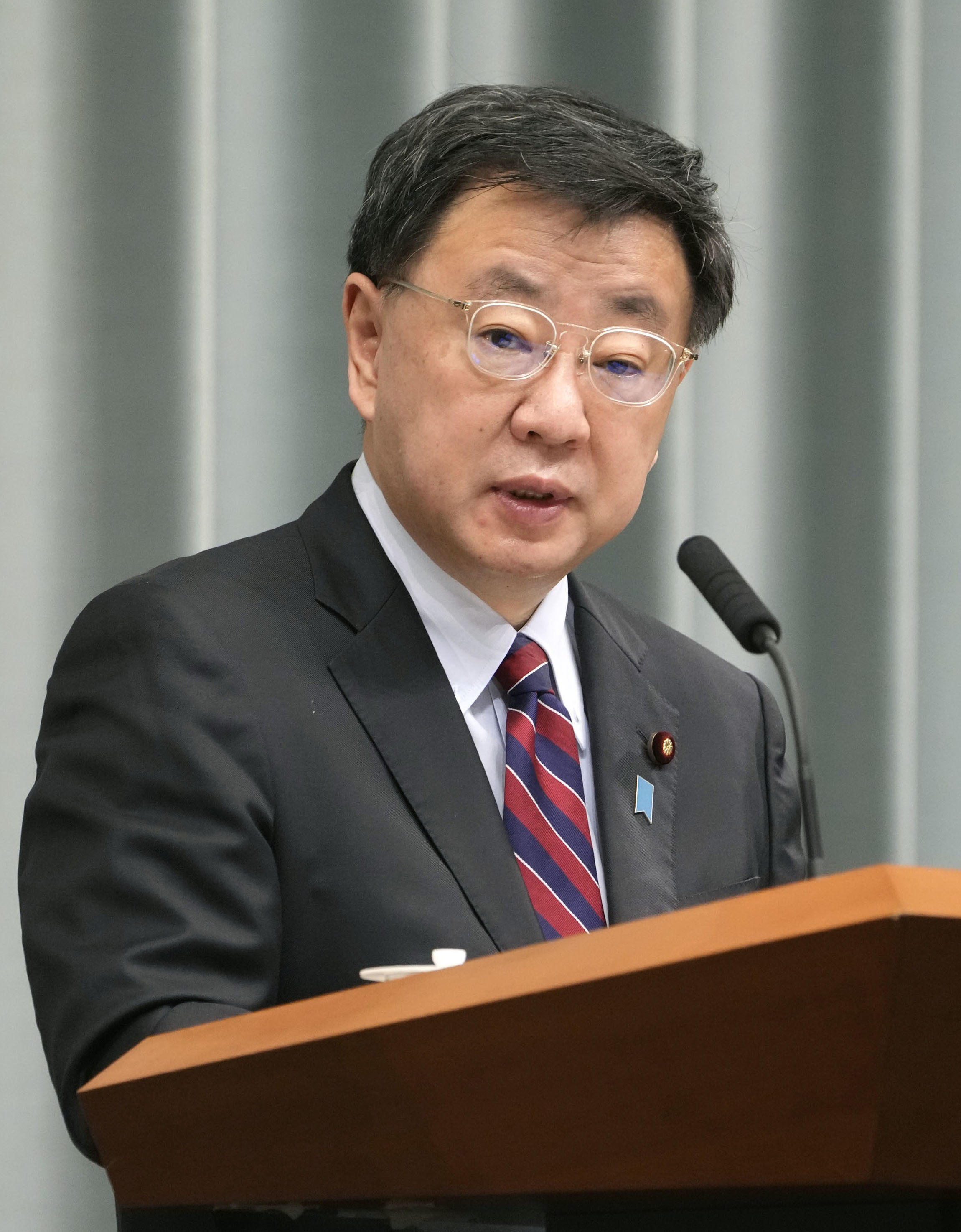 Japanese Chief Cabinet Secretary Hirokazu Matsuno speaks at a news conference at the prime minister's office in Tokyo on April 7.