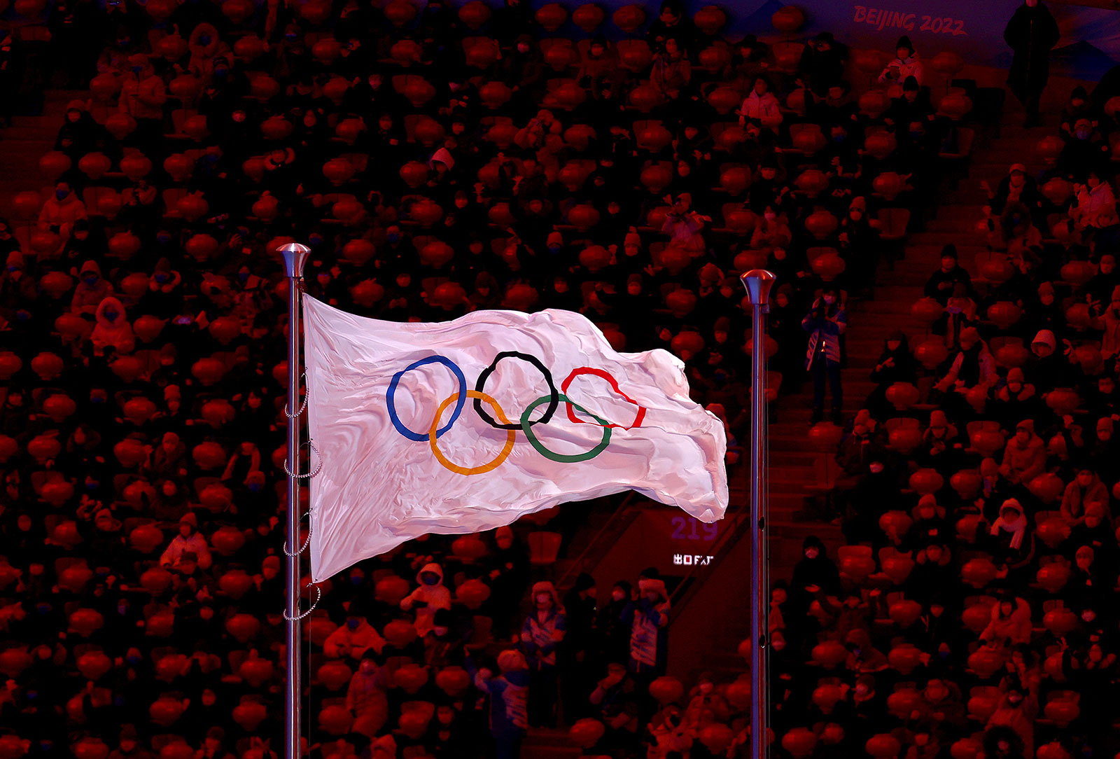 The Olympic flag flies in Beijing National Stadium on February 20. 