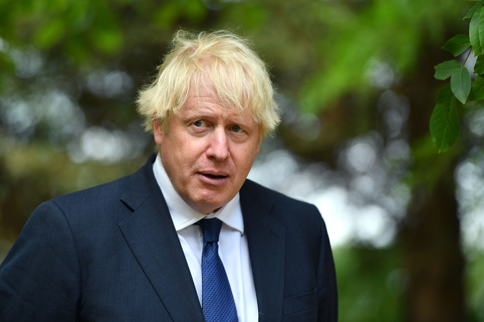 British Prime Minister Boris Johnson attends a ceremony in Alrewas, England, on August 15 to mark the 75th anniversary of Victory over Japan Day. 