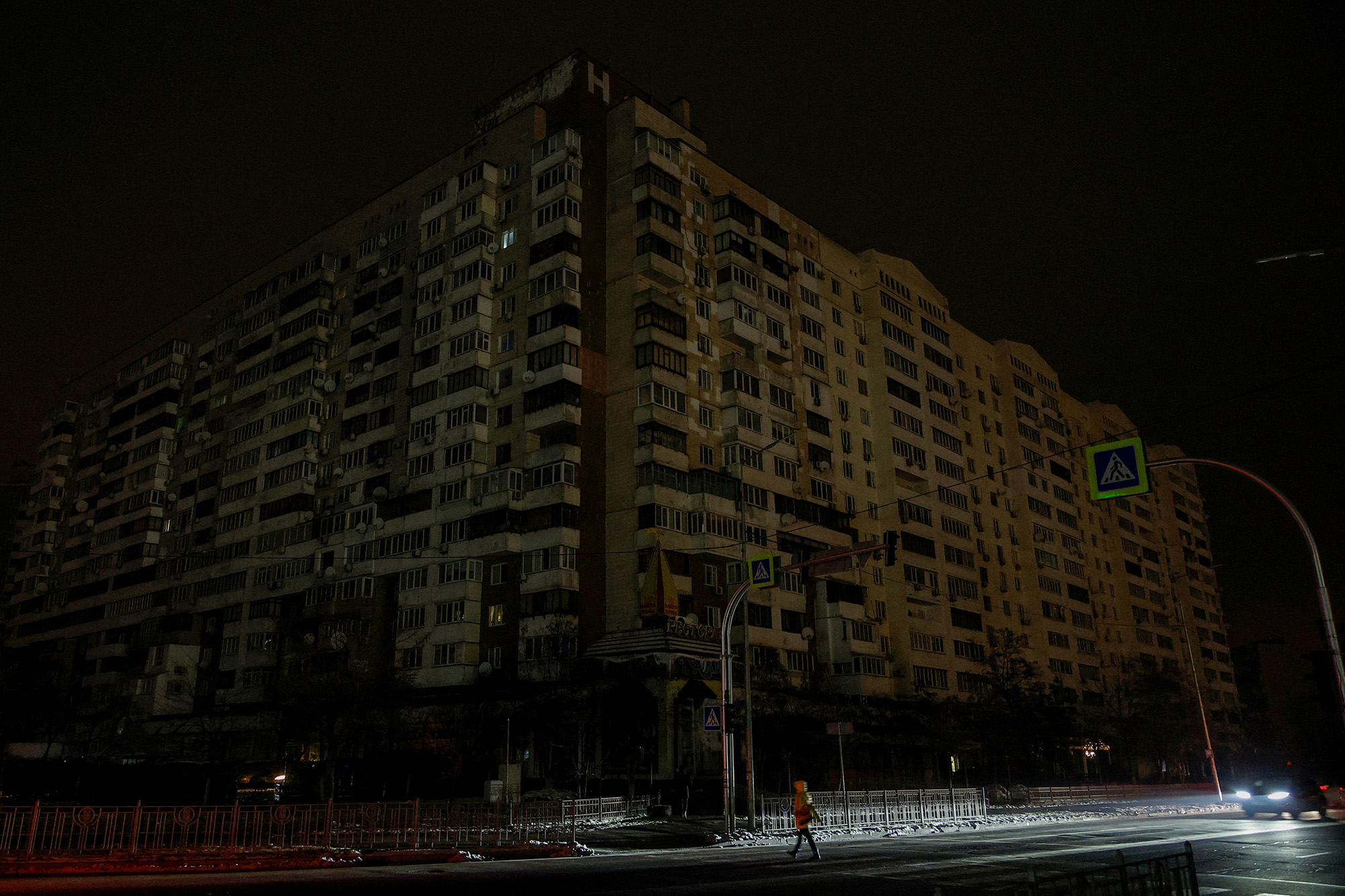 An apartment building without electricity after critical civil infrastructure was hit by Russian missile attacks in Kyiv, Ukraine, on November 23.