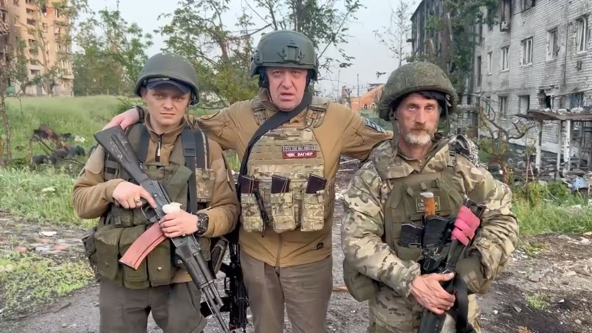 The founder of Wagner private mercenary group Yevgeny Prigozhin, center, makes a statement on the start of withdrawal of his forces from Bakhmut and handing over their positions to regular Russian troops in Bakhmut, Ukraine, in this still image taken from video released on May 25.