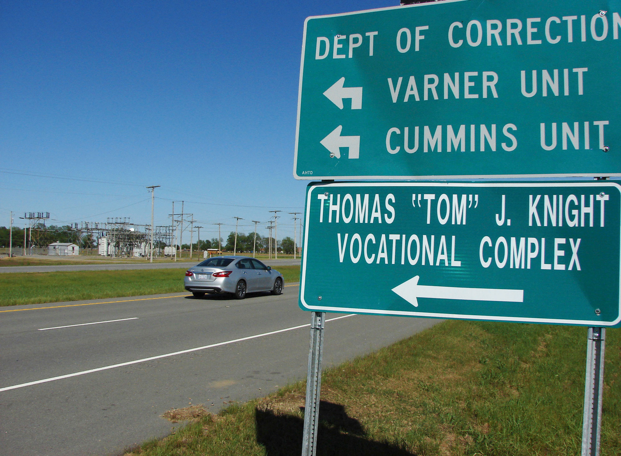 A motorist passes by the entrance to the Cummins Unit prison near Varner, Arkansas, on April 27, 2017.