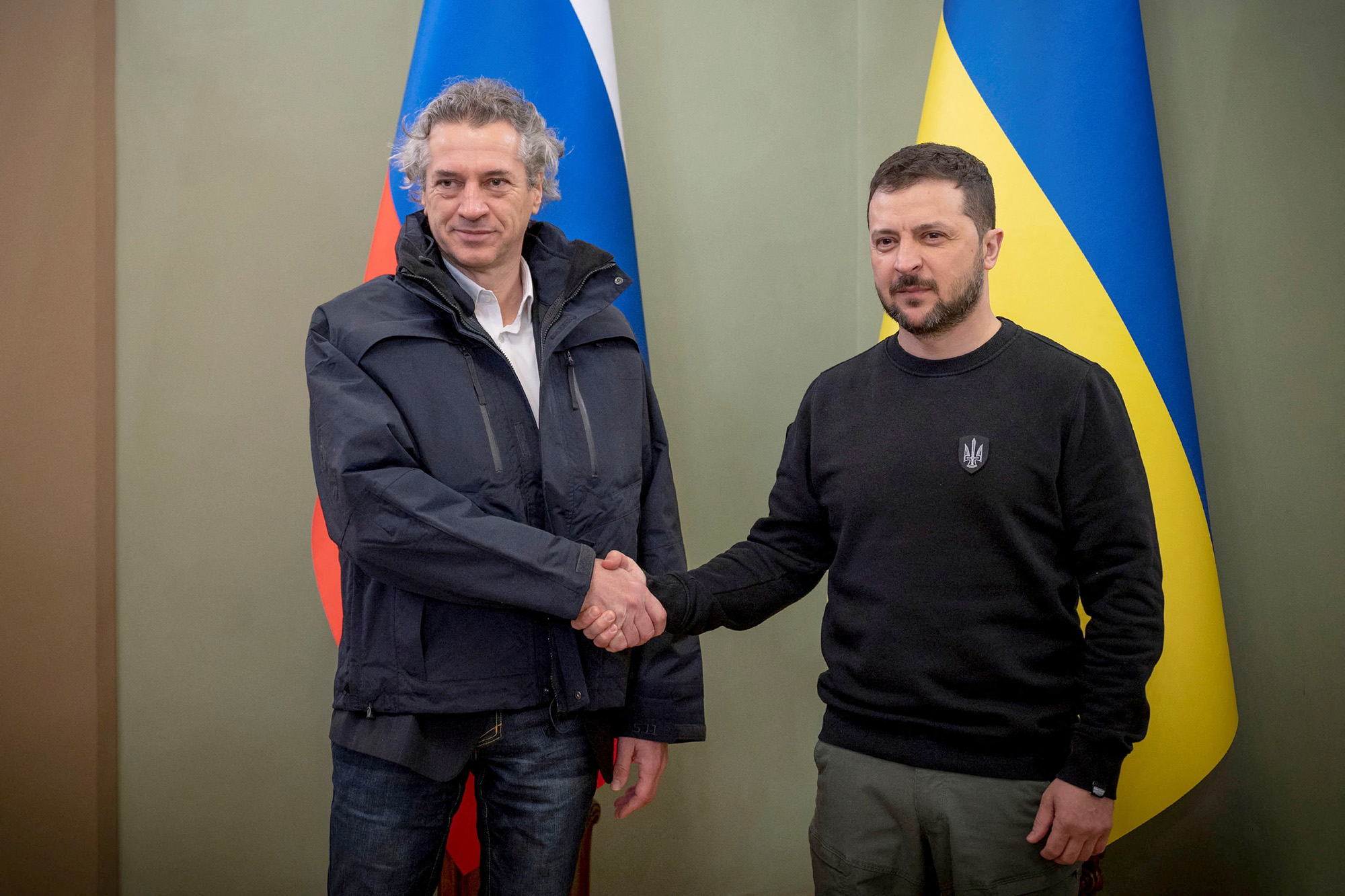 Slovenia's Prime Minister Robert Golob, right, and Ukraine's President Volodymyr Zelenskiy shake hands during their meeting in Kyiv, Ukraine, on March 31.
