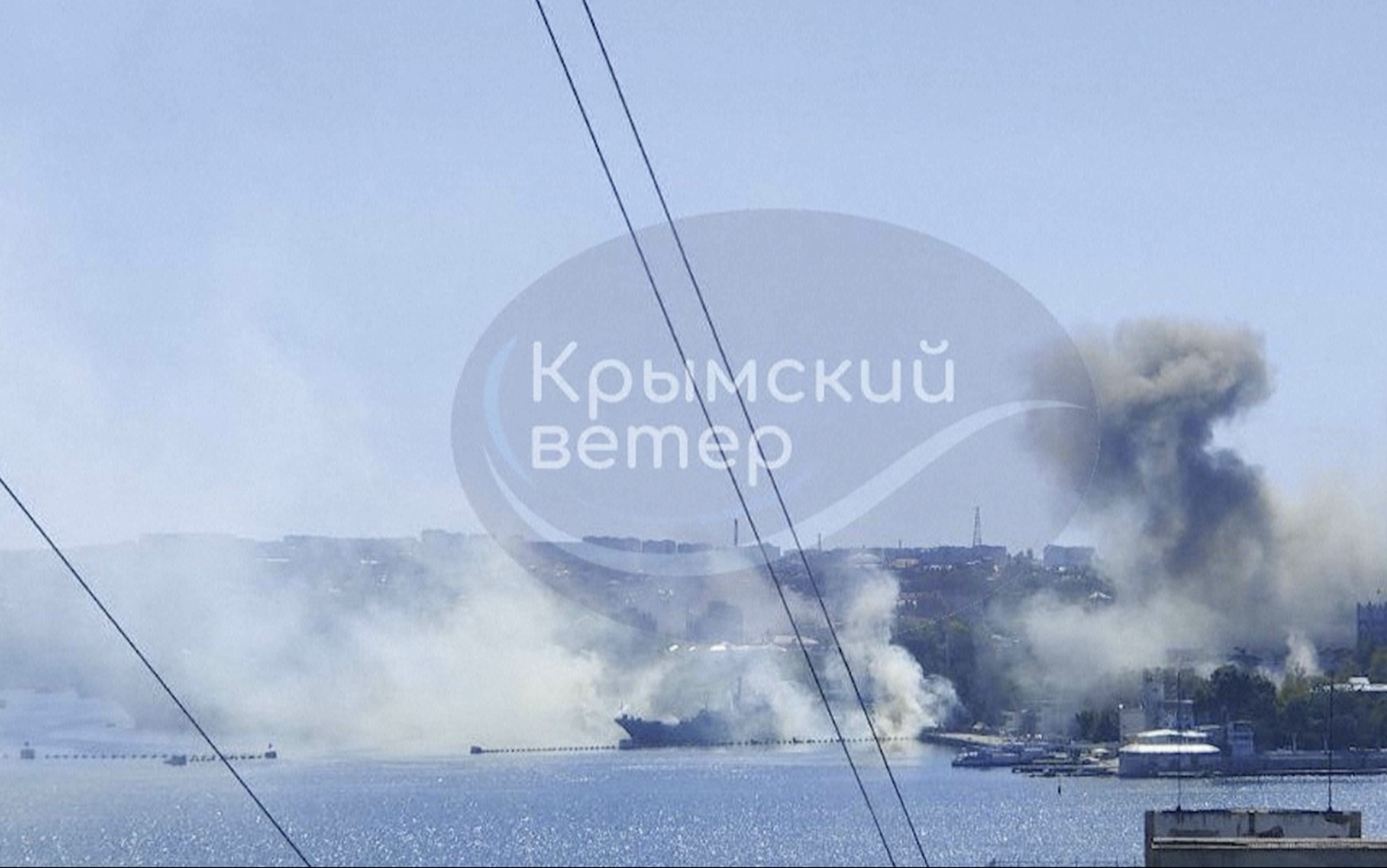 This image taken from a social media video shows smoke rising from the headquarters of Russia’s Black Sea Fleet in Sevastopol, Crimea, on September 22.