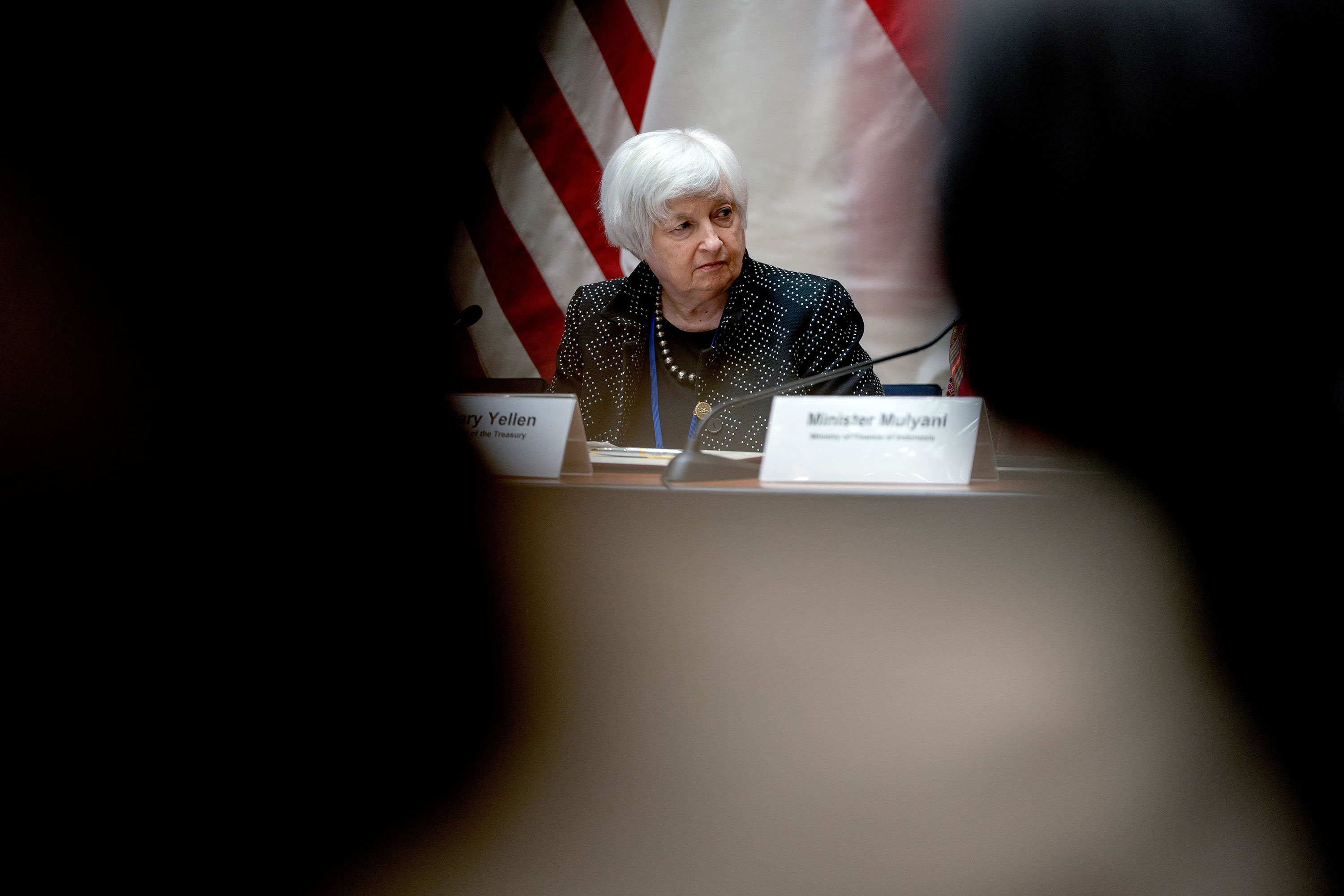 Treasury Secretary Janet Yellen listens during a signing ceremony for the Indonesia Infrastructure and Finance Compact at the International Monetary Fund headquarters in Washington, DC, on April 13. 