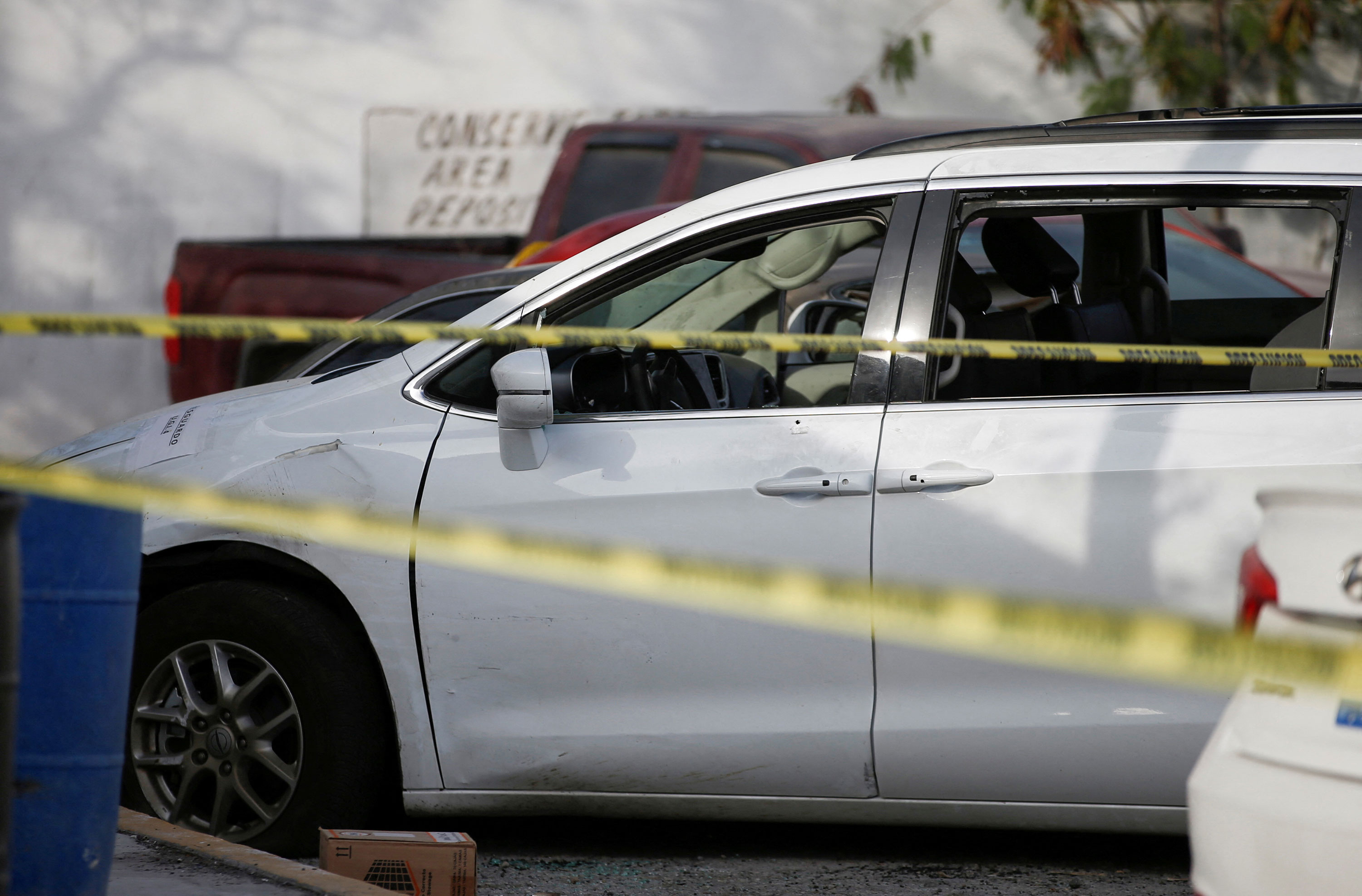 The car driven by the four Americans who were kidnapped is seen secured outside the Forensic Medical Service morgue building in Matamoros, Mexico, on Tuesday.