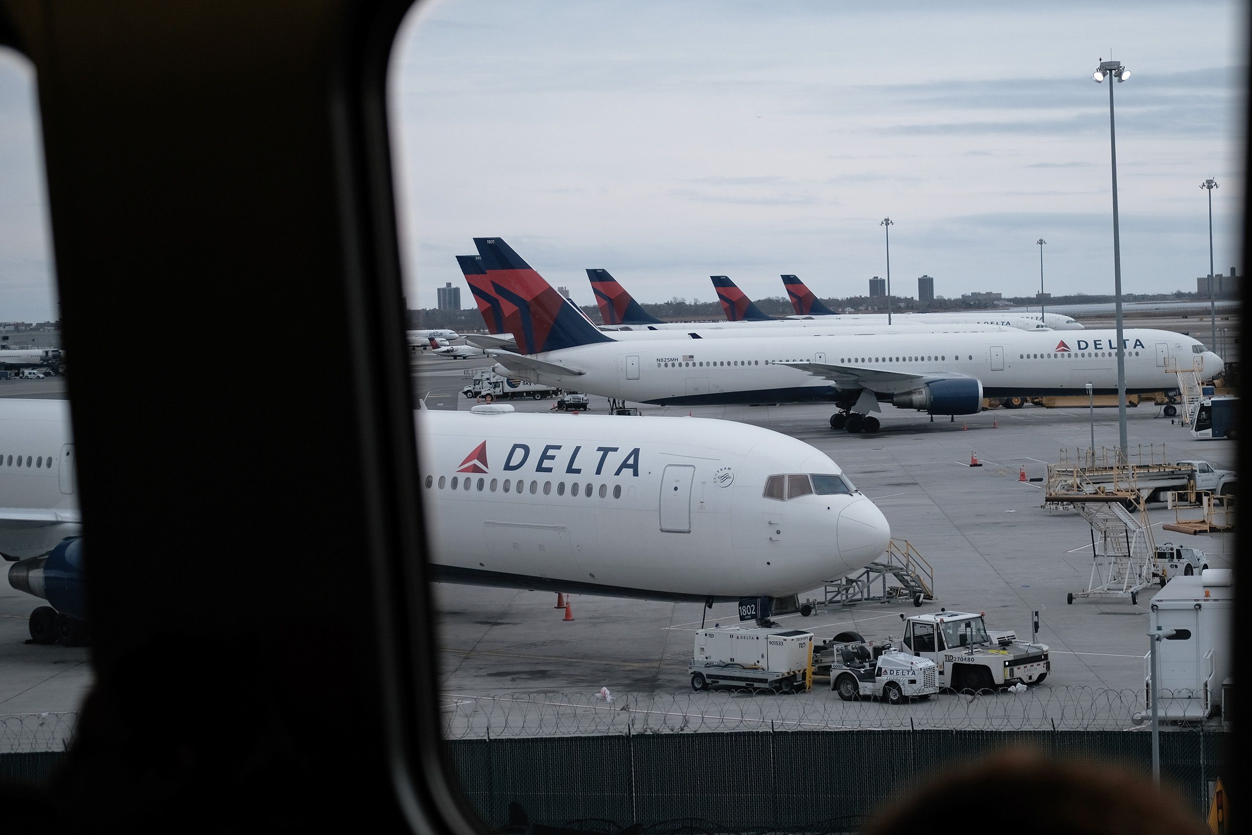 Delta airplanes sit on the tarmac at John F. Kennedy Airport (JFK) on January 31, in New York. 