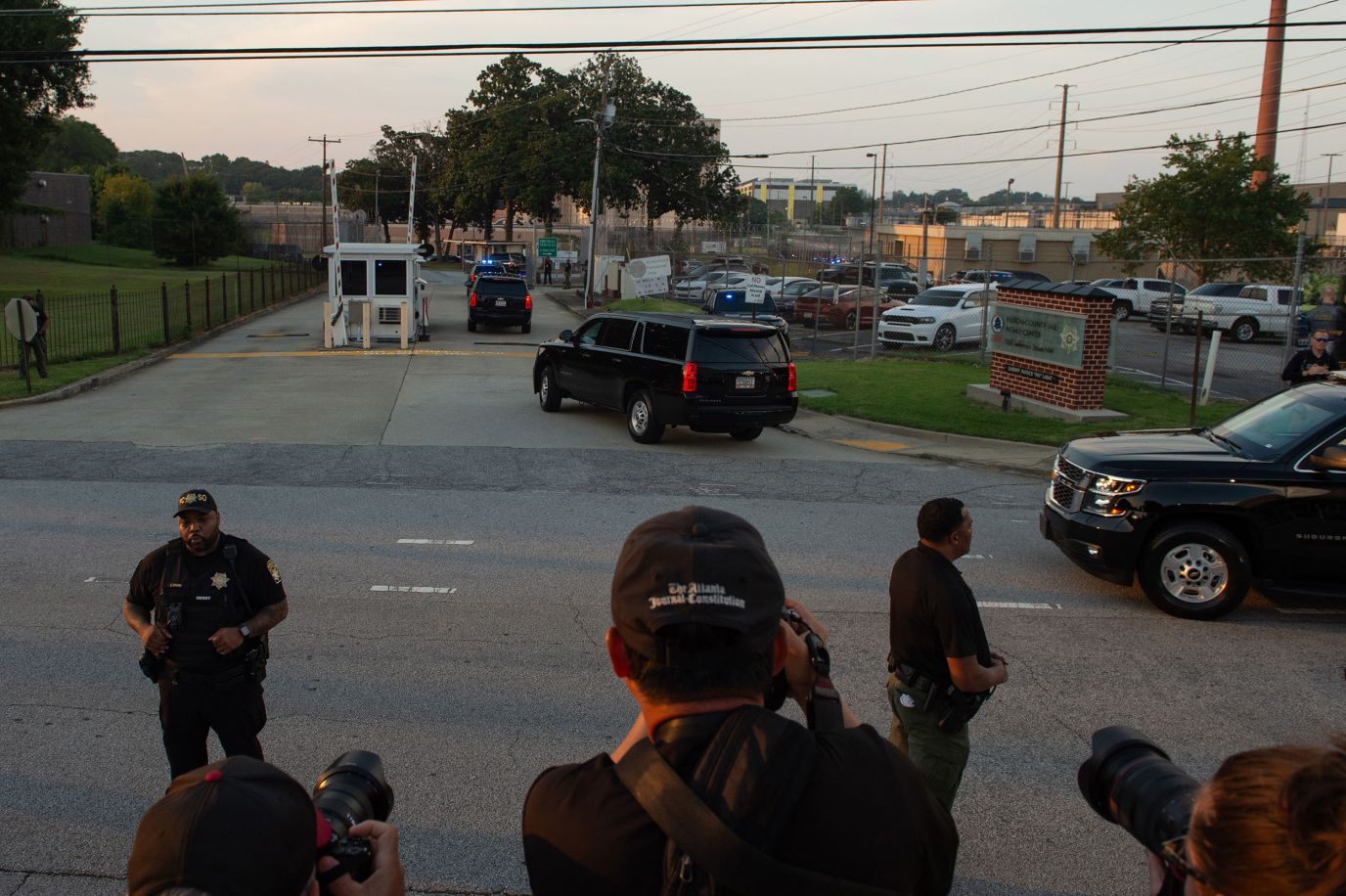 Trump's motorcade arrives at the Fulton County jail in Atlanta on Thursday. 