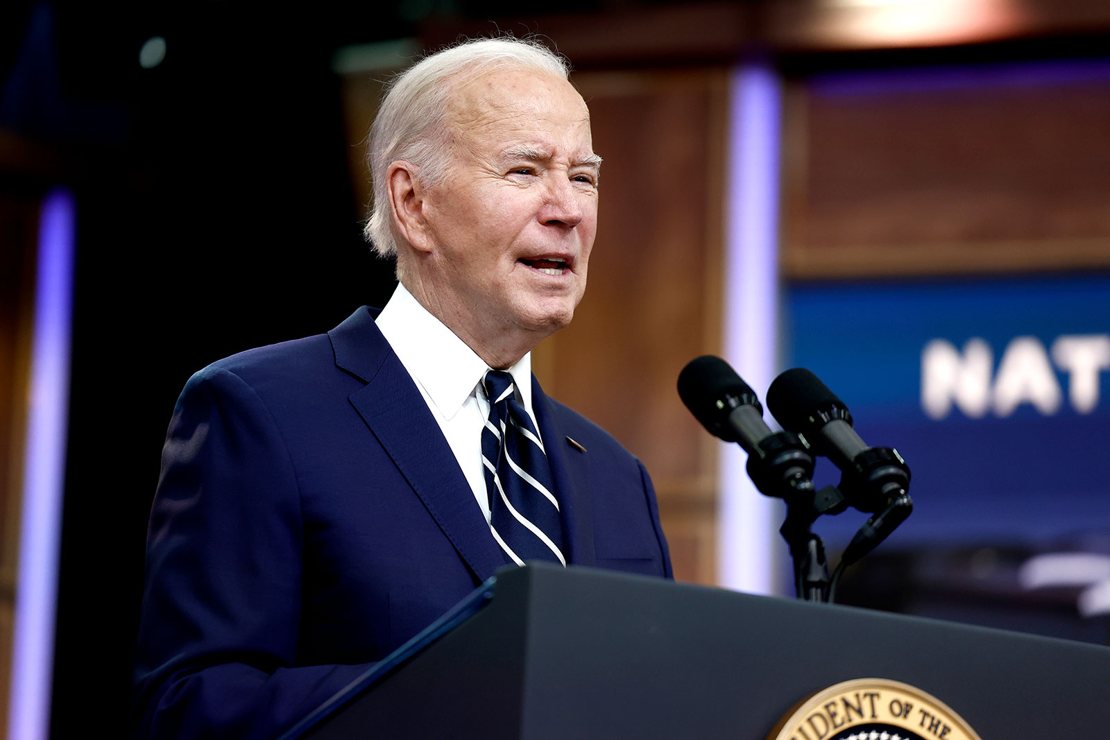 US President Joe Biden gives remarks in the Eisenhower Executive Office Building on the White House campus on Friday in Washington, DC. 
