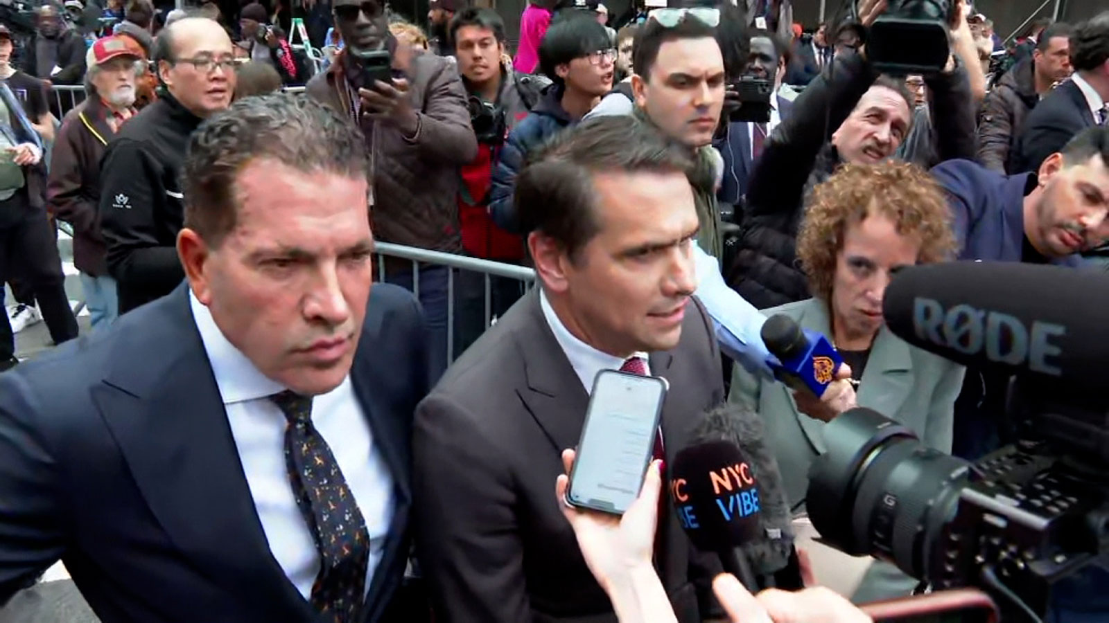 Donald Trump's attorney Todd Blanche, center, speaks to the media after the arraignment on Tuesday. 